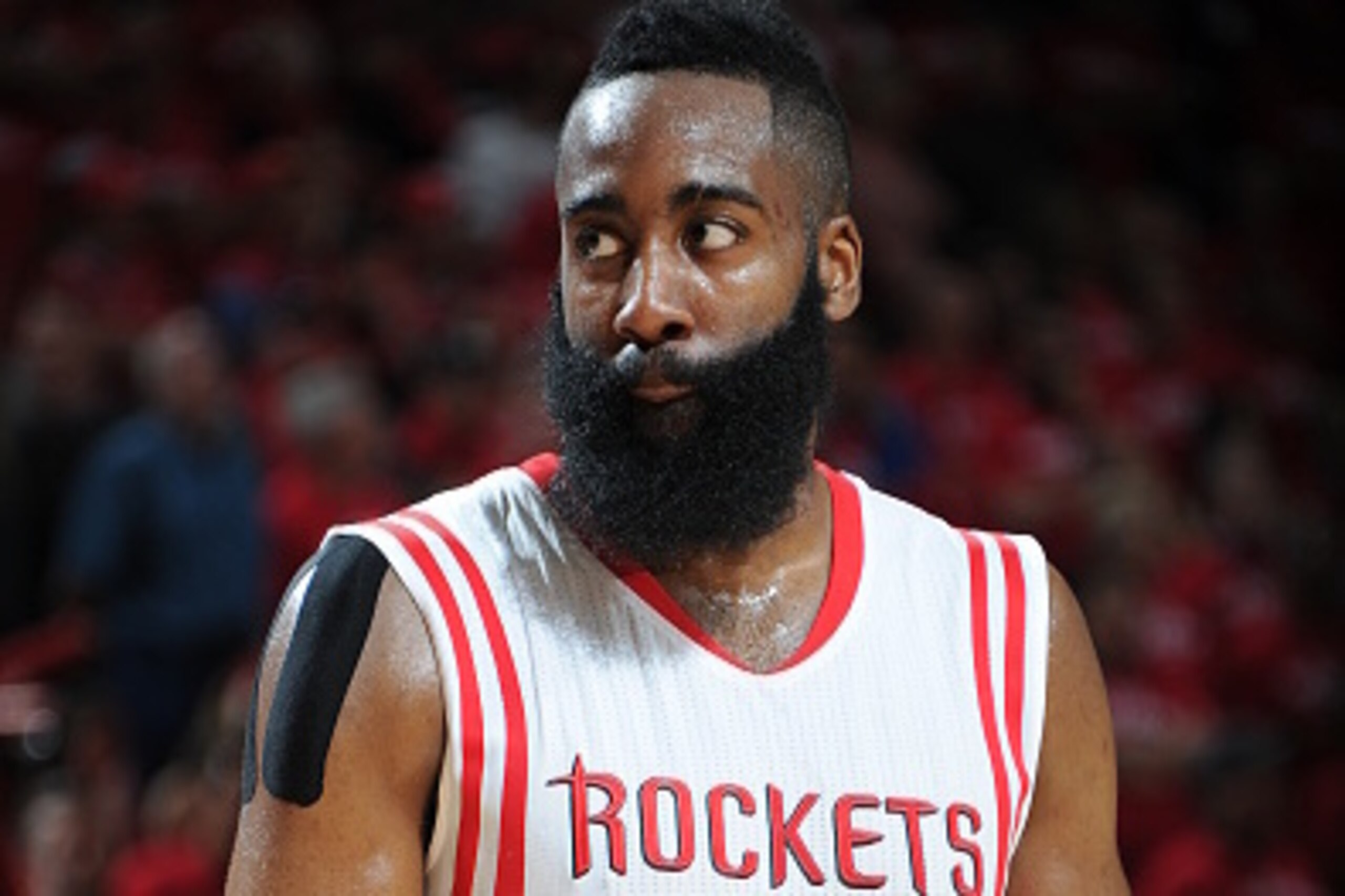 HOUSTON, TX - MAY 6:  James Harden #13 of the Houston Rockets looks on against the Los Angeles Clippers in Game Two of the Western Conference Semifinals during the 2015 NBA Playoffs on May 6, 2015 at the Toyota Center in Houston, Texas. NOTE TO USER: User