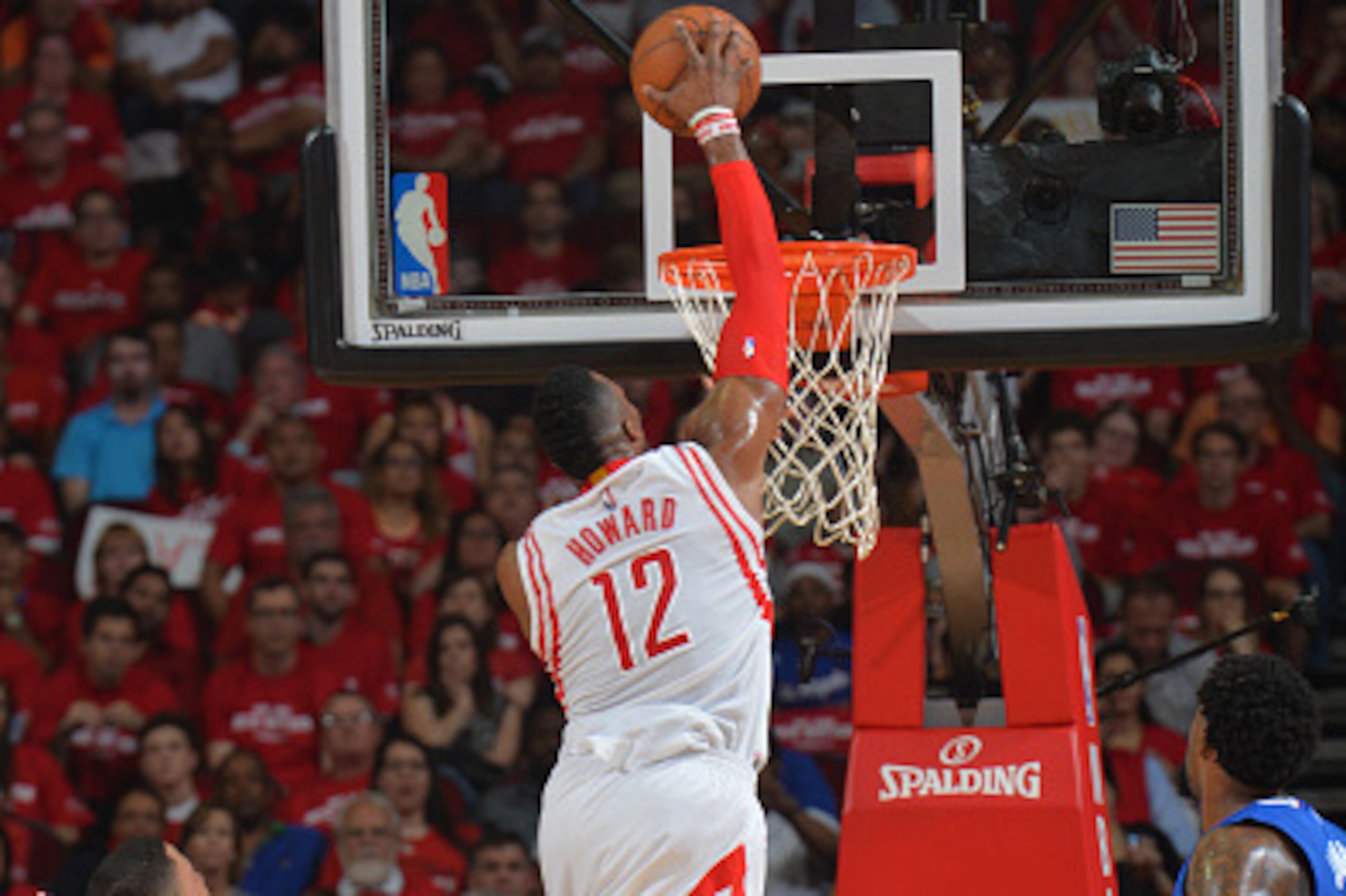 HOUSTON,TX : Dwight Howard #12 of the Houston Rockets dunks the ball against the Los Angeles Clippers at the Toyota Center During Game Two of the Western Conference Semifinals during the 2015 NBA Playoffs on May 6, 2015 in Houston,Texas NOTE TO USER: User