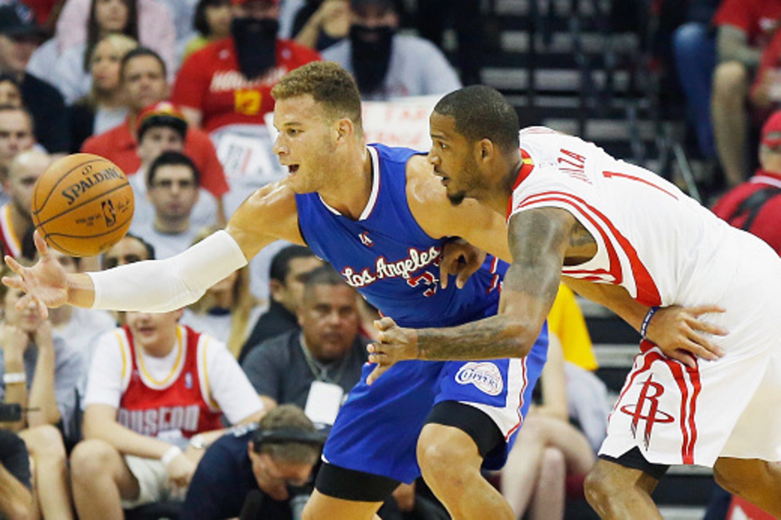 HOUSTON, TX - MAY 04:  Blake Griffin #32 of the Los Angeles Clippers battles for the basketball with Trevor Ariza #1 of the Houston Rockets during Game One in the Western Conference Semifinals of the 2015 NBA Playoffs on May 4, 2015 at the Toyota Center i