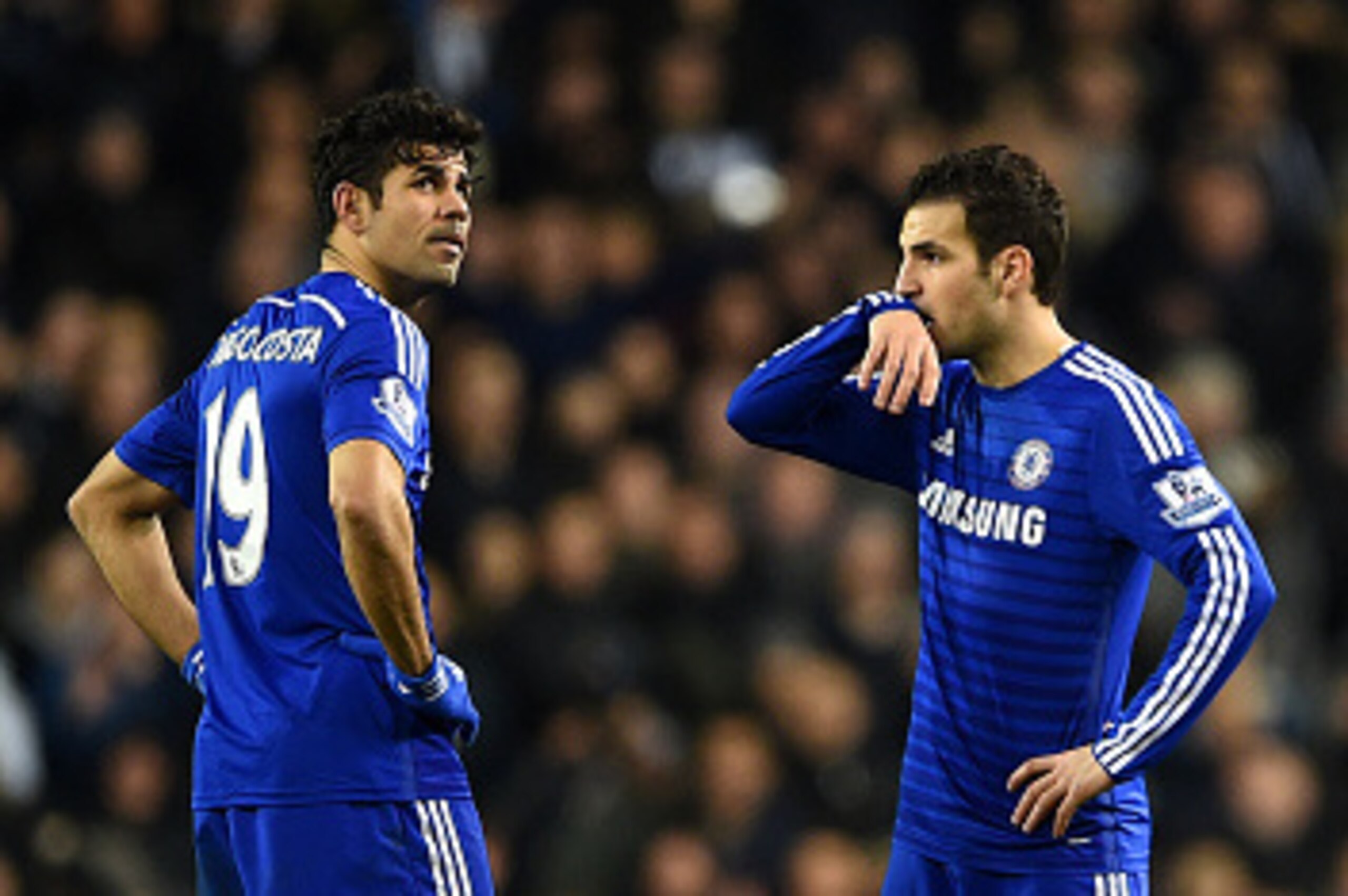 LONDON, ENGLAND - JANUARY 01:  Cesc Fabregas and Diego Costa of Chelsea show their dejection after conceding a fourth goal during the Barclays Premier League match between Tottenham Hotspur and Chelsea at White Hart Lane on January 1, 2015 in London, Engl