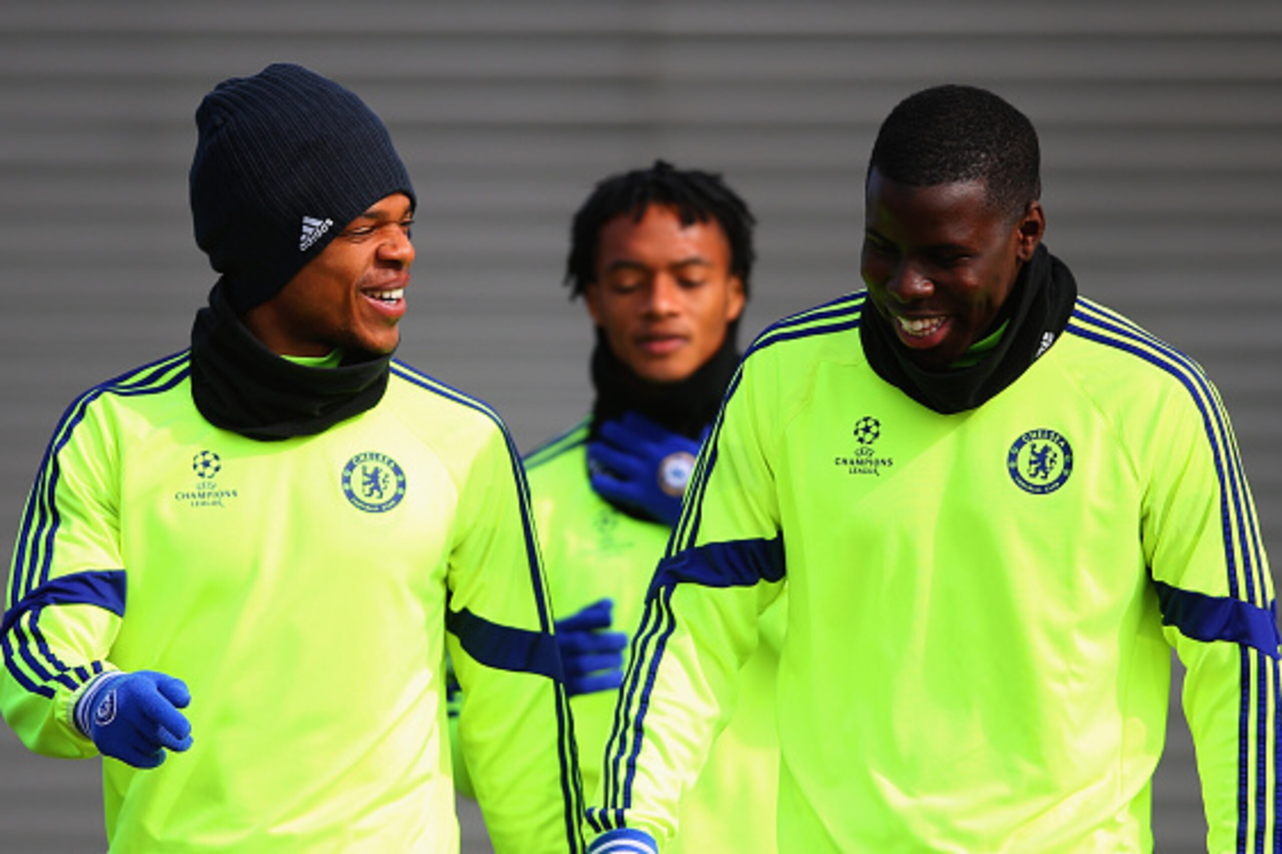 COBHAM, ENGLAND - MARCH 10:  Loic Remy (L) and Kurt Zouma in discussion during a Chelsea training session ahead of the UEFA Champions League Round of 16 second leg match against Paris Saint-Germain at Chelsea Training Ground on March 10, 2015 in Cobham, E