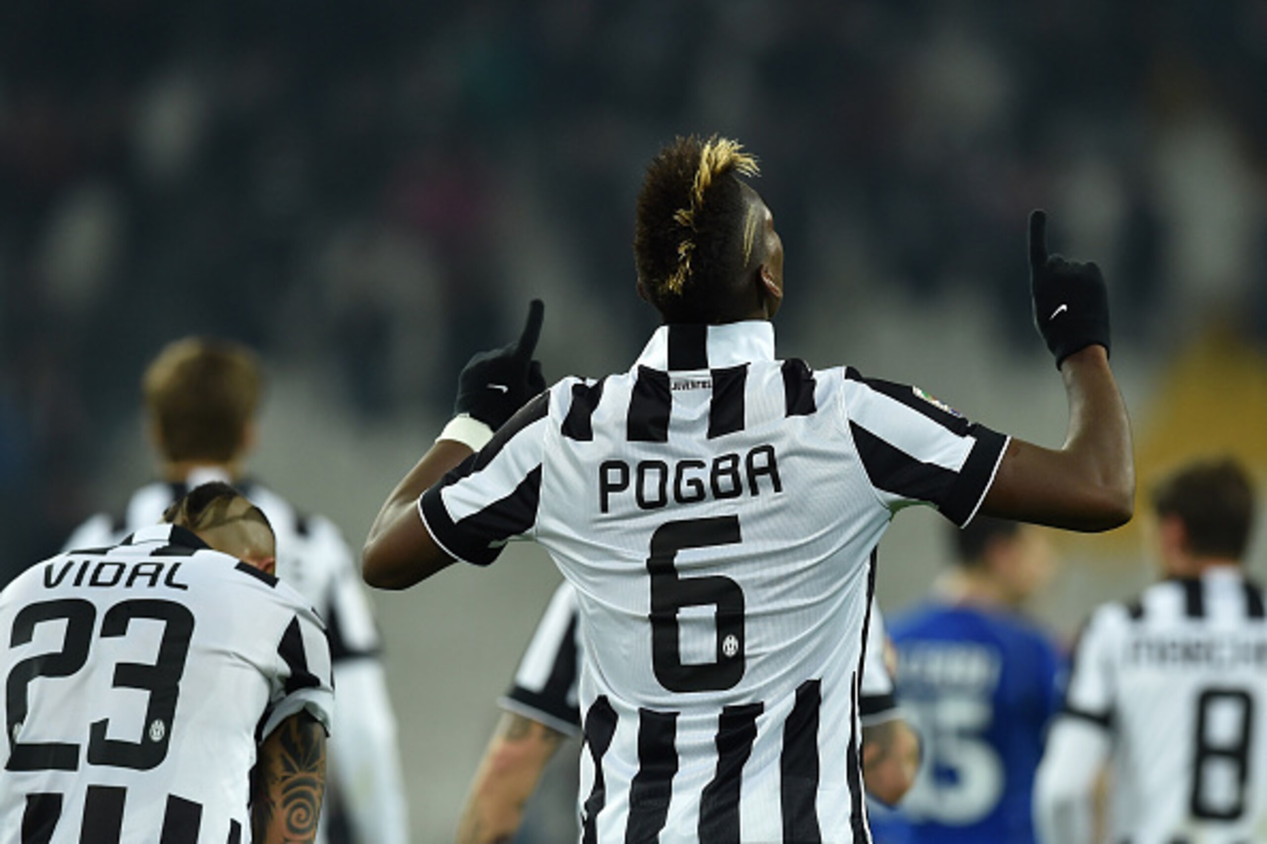 TURIN, ITALY - MARCH 09:  Paul Pogba of Juventus FC celebrates after scoring the opening goal during the Serie A match between Juventus FC and US Sassuolo Calcio at Juventus Arena on March 9, 2015 in Turin, Italy.  (Photo by Valerio Pennicino/Getty Images