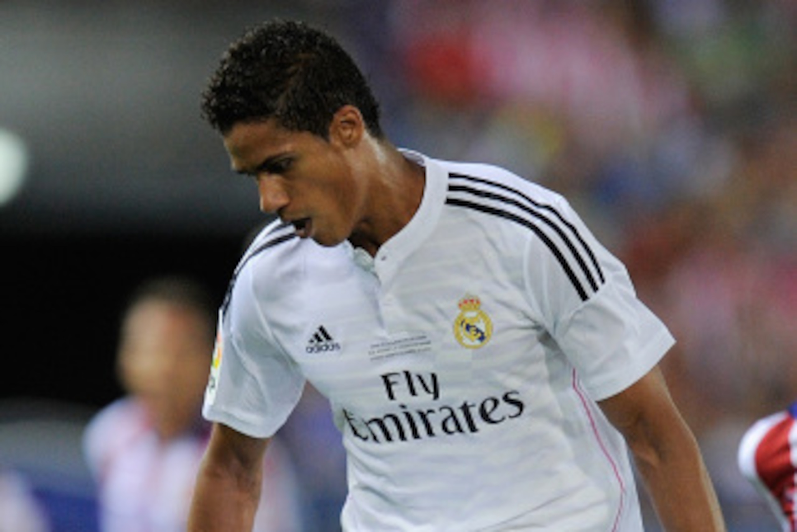 MADRID, SPAIN - AUGUST 22:  Raphael Varane of Real Madrid in action during the Supercopa, second leg match between Club Atletico de Madrid and Real Madrid at Vicente Caldron stadium on August 22, 2014 in Madrid, Spain.  (Photo by Denis Doyle/Getty Images)