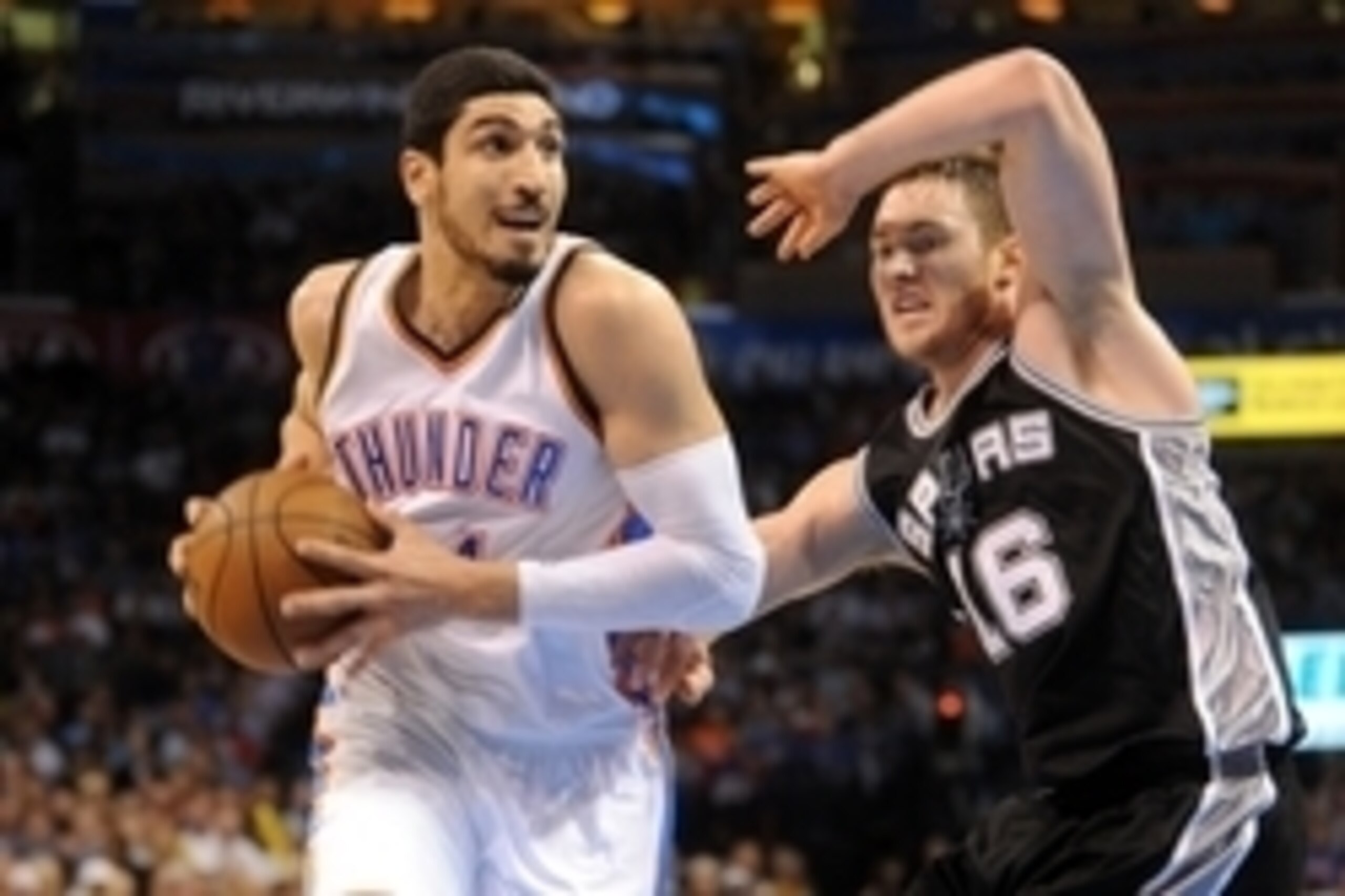 Apr 7, 2015; Oklahoma City, OK, USA; Oklahoma City Thunder center Enes Kanter (34) drives to the basket against San Antonio Spurs center Aron Baynes (16) during the first quarter at Chesapeake Energy Arena. Mandatory Credit: Mark D. Smith-USA TODAY Sports Apr 7, 2015; Oklahoma City, OK, USA; Oklahoma City Thunder center Enes Kanter (34) drives to the basket against San Antonio Spurs center Aron Baynes (16) during the first quarter at Chesapeake Energy Arena. Mandatory Credit: Mark D. Smith-USA TODAY Sports