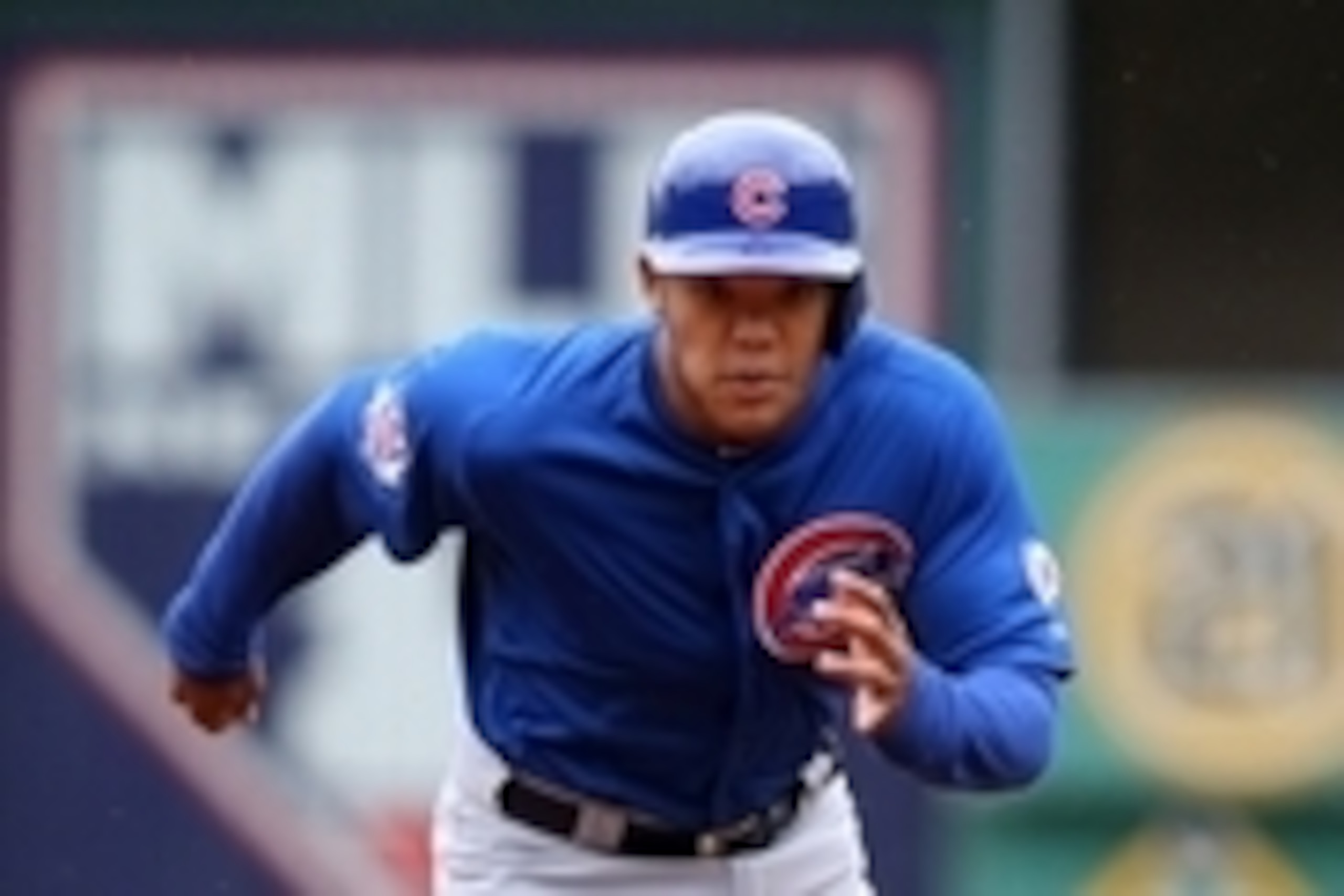 Apr 23, 2015; Pittsburgh, PA, USA; Chicago Cubs second baseman Addison Russell (22) runs from second base to third on a steal attempt against the Pittsburgh Pirates during the fourth inning at PNC Park. Mandatory Credit: Charles LeClaire-USA TODAY Sports
