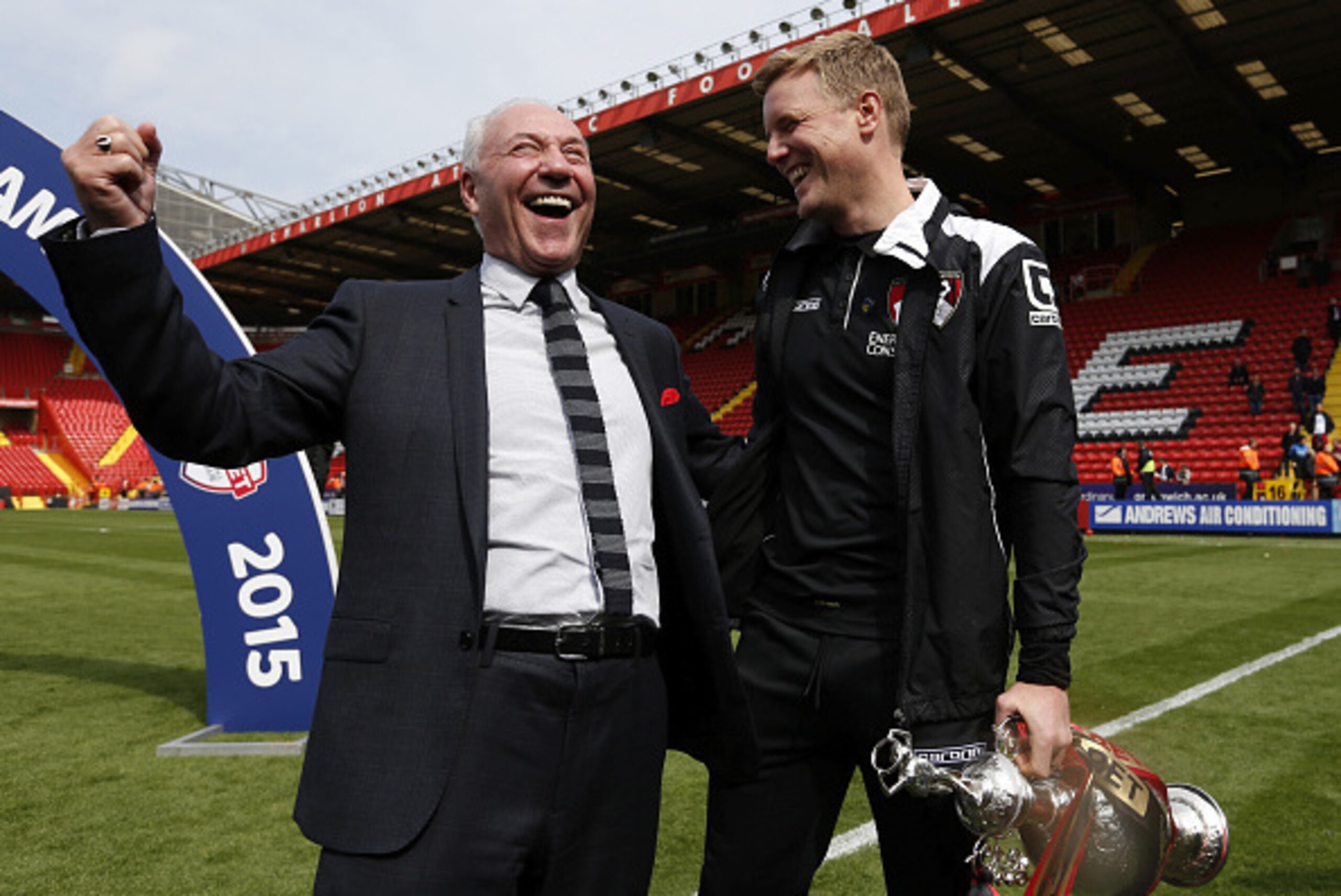 LONDON, ENGLAND - MAY 02: Bournemouth chairman Jeff Mostyn and Eddie Howe, manager of Bournemouth pose with the trophy after winning the Championship during the Sky Bet Championship match between Charlton Athletic and AFC Bournemouth at The Valley on May 