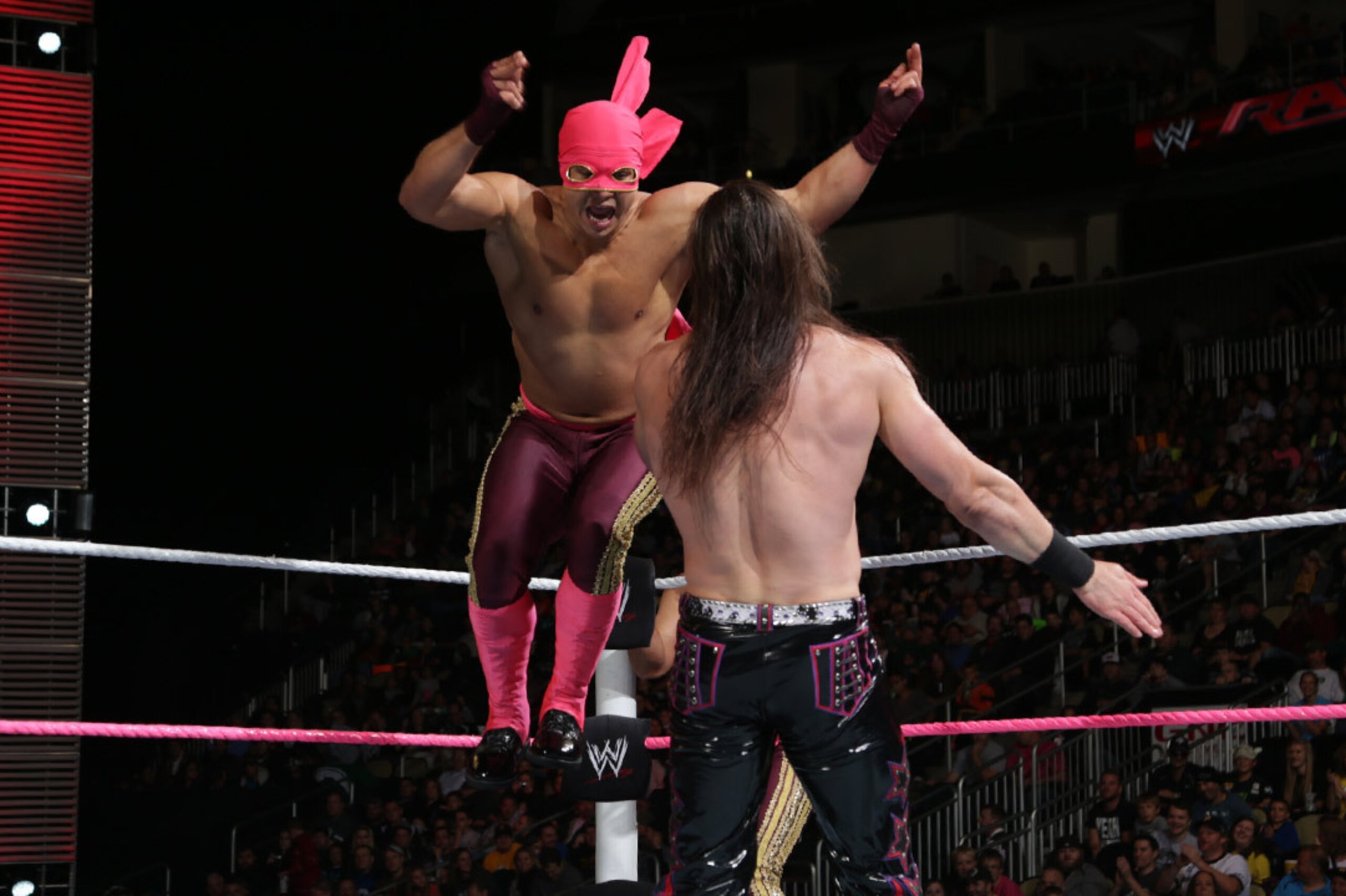 Diego of Los Matadores flies at Drew McIntyre.