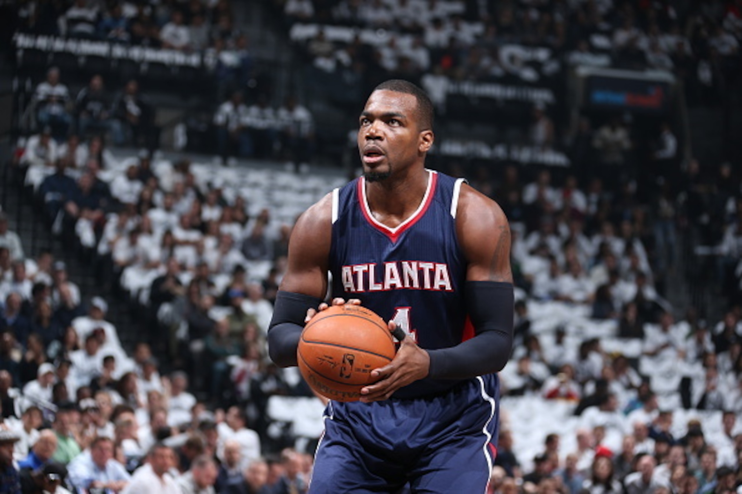 BROOKLYN, NY - MAY 1:  Paul Millsap #4 of the Atlanta Hawks shoots a free throw against the Brooklyn Nets in Game Six of the Eastern Conference Quarterfinals during the 2015 NBA Playoffs on May 1, 2015 at Barclays Center in Brooklyn, New York. NOTE TO USE