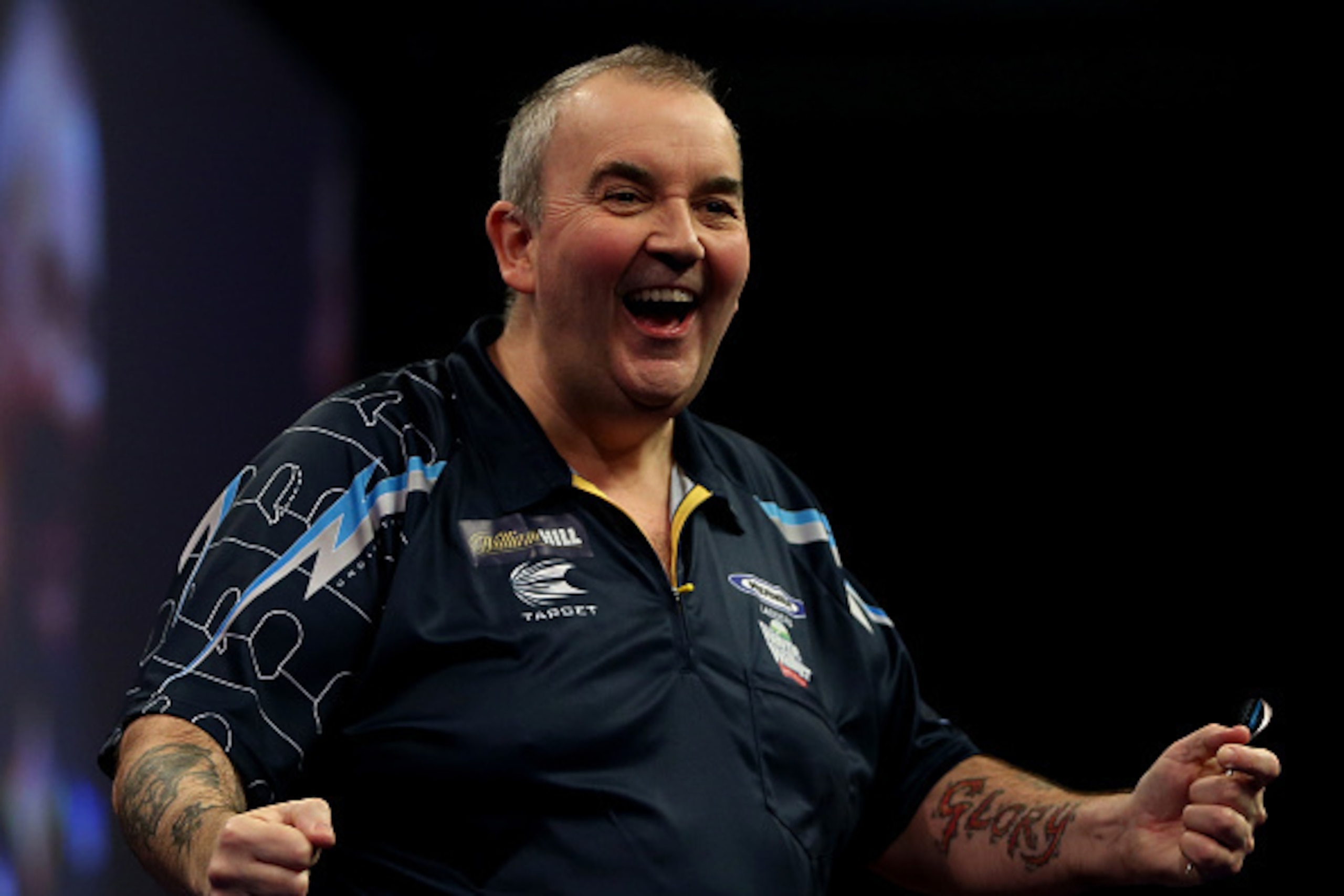 LONDON, ENGLAND - JANUARY 04: Phil Taylor of England celebrates winnin a set during the final of the 2015 William Hill PDC World Darts Championships at Alexandra Palace on January 4, 2015 in London, England. (Photo by Ben Hoskins/Getty Images) LONDON, ENGLAND - JANUARY 04: Phil Taylor of England celebrates winnin a set during the final of the 2015 William Hill PDC World Darts Championships at Alexandra Palace on January 4, 2015 in London, England. (Photo by Ben Hoskins/Getty Images)