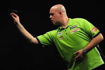 EXETER, ENGLAND - MARCH 05:  Michael van Gerwen of Holland competes against Peter Wright of Scotland during The Betway Premier League Darts at Westpoint Arena on March 5, 2015 in Exeter, England.  (Photo by Dan Mullan/Getty Images)