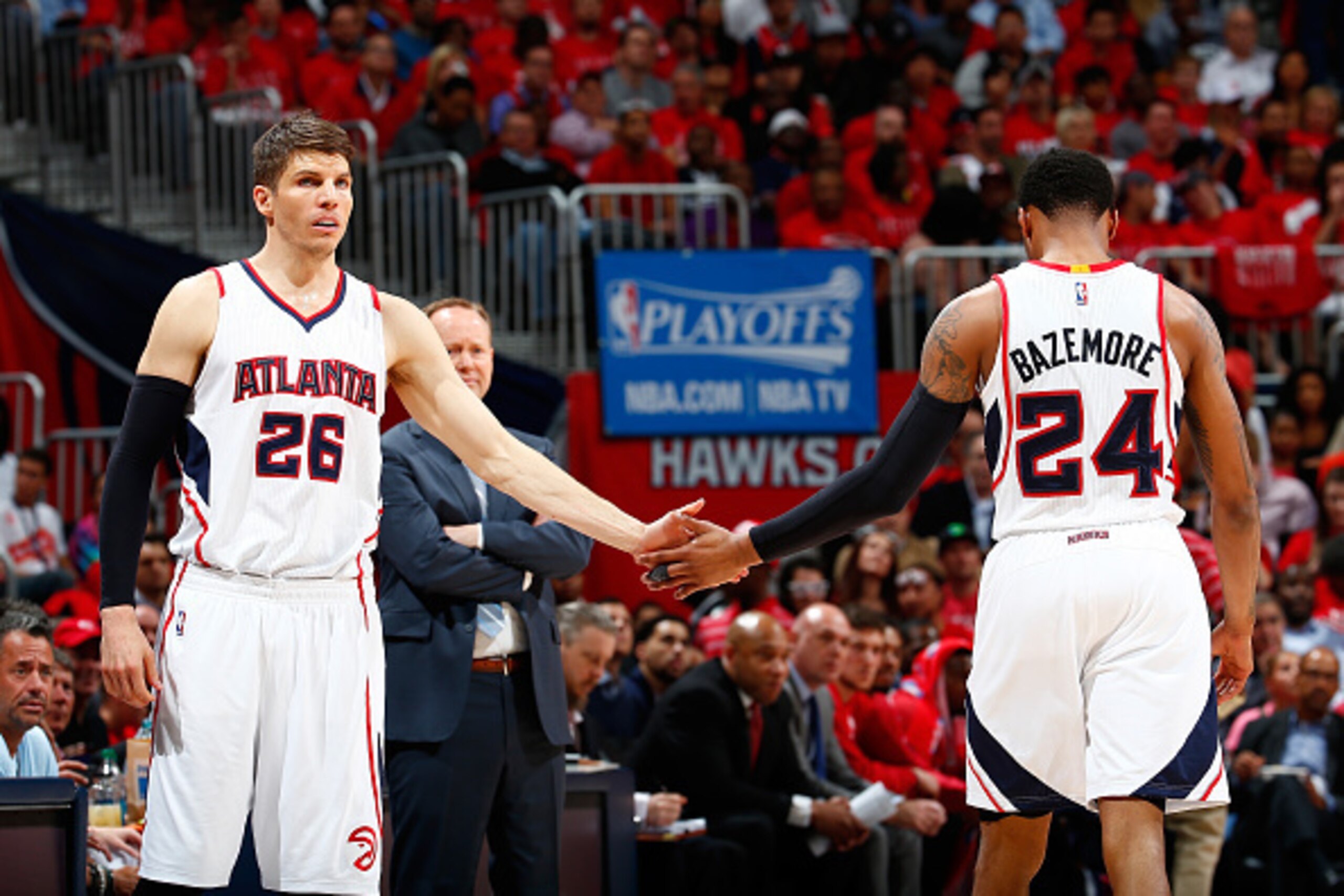 ATLANTA, GA - APRIL 29: Kyle Korver #26 of the Atlanta Hawks slaps hands as he replaces Kent Bazemore #24 against the Brooklyn Nets during Game Five of the Eastern Conference Quarterfinals of the NBA Playoffs at Philips Arena on April 29, 2015 in Atlanta ATLANTA, GA - APRIL 29: Kyle Korver #26 of the Atlanta Hawks slaps hands as he replaces Kent Bazemore #24 against the Brooklyn Nets during Game Five of the Eastern Conference Quarterfinals of the NBA Playoffs at Philips Arena on April 29, 2015 in Atlanta