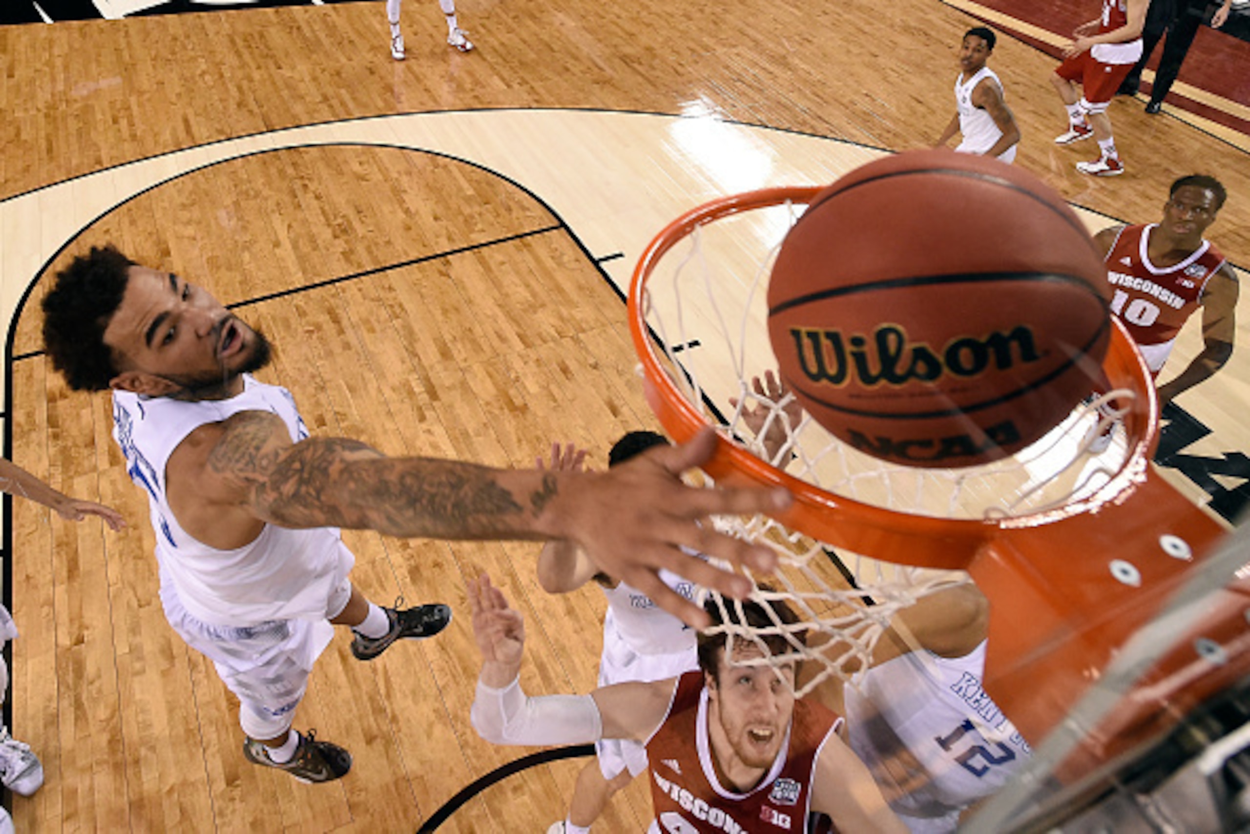 INDIANAPOLIS, IN - APRIL 04: Willie Cauley-Stein #15 of the Kentucky Wildcats shoots in the second half against the Wisconsin Badgers during the NCAA Men's Final Four Semifinal at Lucas Oil Stadium on April 4, 2015 in Indianapolis, Indiana.  (Photo by Chr