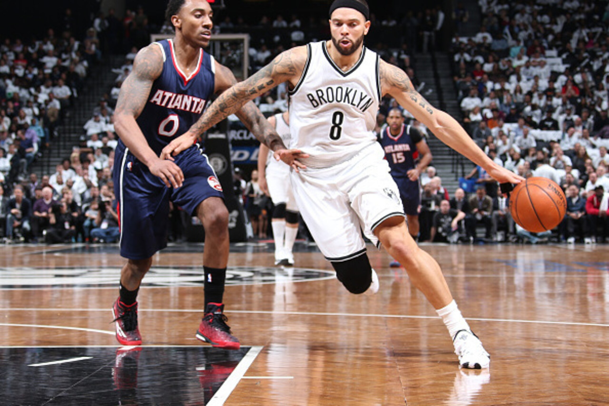 BROOKLYN, NY - APRIL 27: Deron Williams #8 of the Brooklyn Nets drives to the basket against the Atlanta Hawks during Game Four of the Eastern Conference Quarterfinals during the NBA Playoffs on April 27, 2015 at Barclays Center in Brooklyn, NY. NOTE TO U