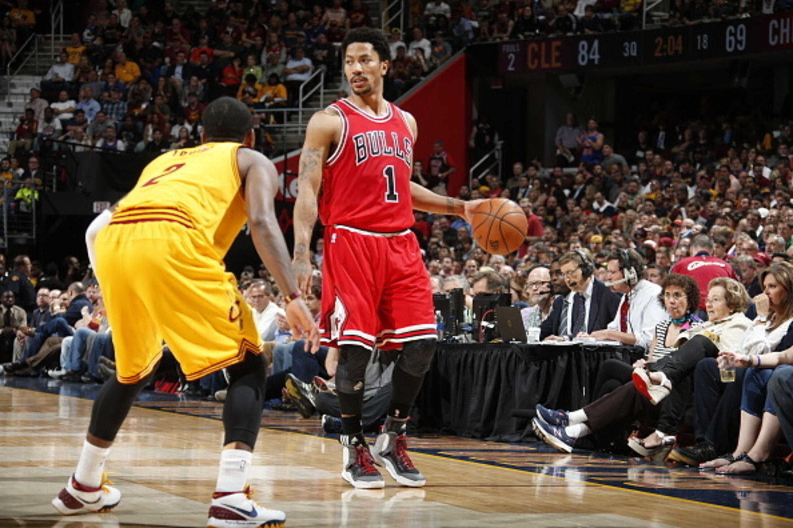CLEVELAND, OHIO - MAY 6: Derrick Rose #1 of the Chicago Bulls defends the ball against Kyrie Irving #2 of the Cleveland Cavaliers during Game Two of the Eastern Conference Semifinals during the NBA Playoffs on May 6, 2015 at Quicken Loans Arena in Clevela