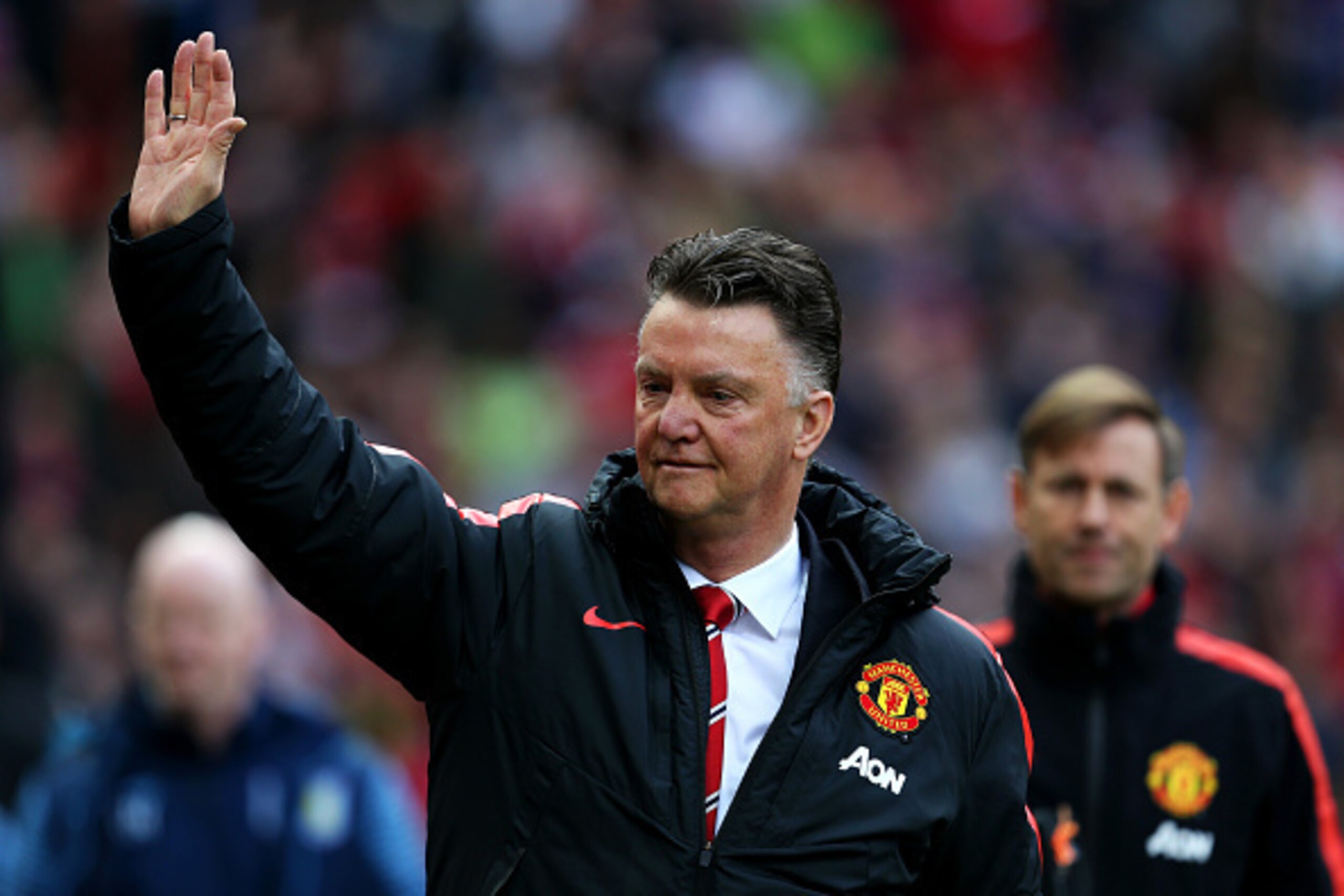 MANCHESTER, ENGLAND - APRIL 04:  Louis van Gaal, manager of Manchester United waves to the fans as he walks out for the Barclays Premier League match between Manchester United and Aston Villa at Old Trafford on April 4, 2015 in Manchester, England.  (Phot