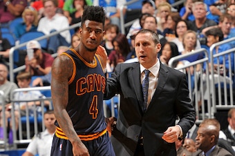 ORLANDO, FL - MARCH 15:  Iman Shumpert #4 and head coach David Blatt of the Cleveland Cavaliers talk during the game against the Orlando Magic on March 15, 2015 at Amway Center in Orlando, Florida. NOTE TO USER: User expressly acknowledges and agrees that