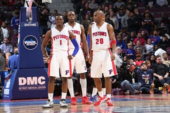 AUBURN HILLS, MI - FEBRUARY 27:  Reggie Jackson #1, Anthony Tolliver #43 and Jodie Meeks #20 of the Detroit Pistons stand on the court against the New York Knicks on February 27, 2015 at The Palace of Auburn Hills in Auburn Hills, Michigan. NOTE TO USER: 