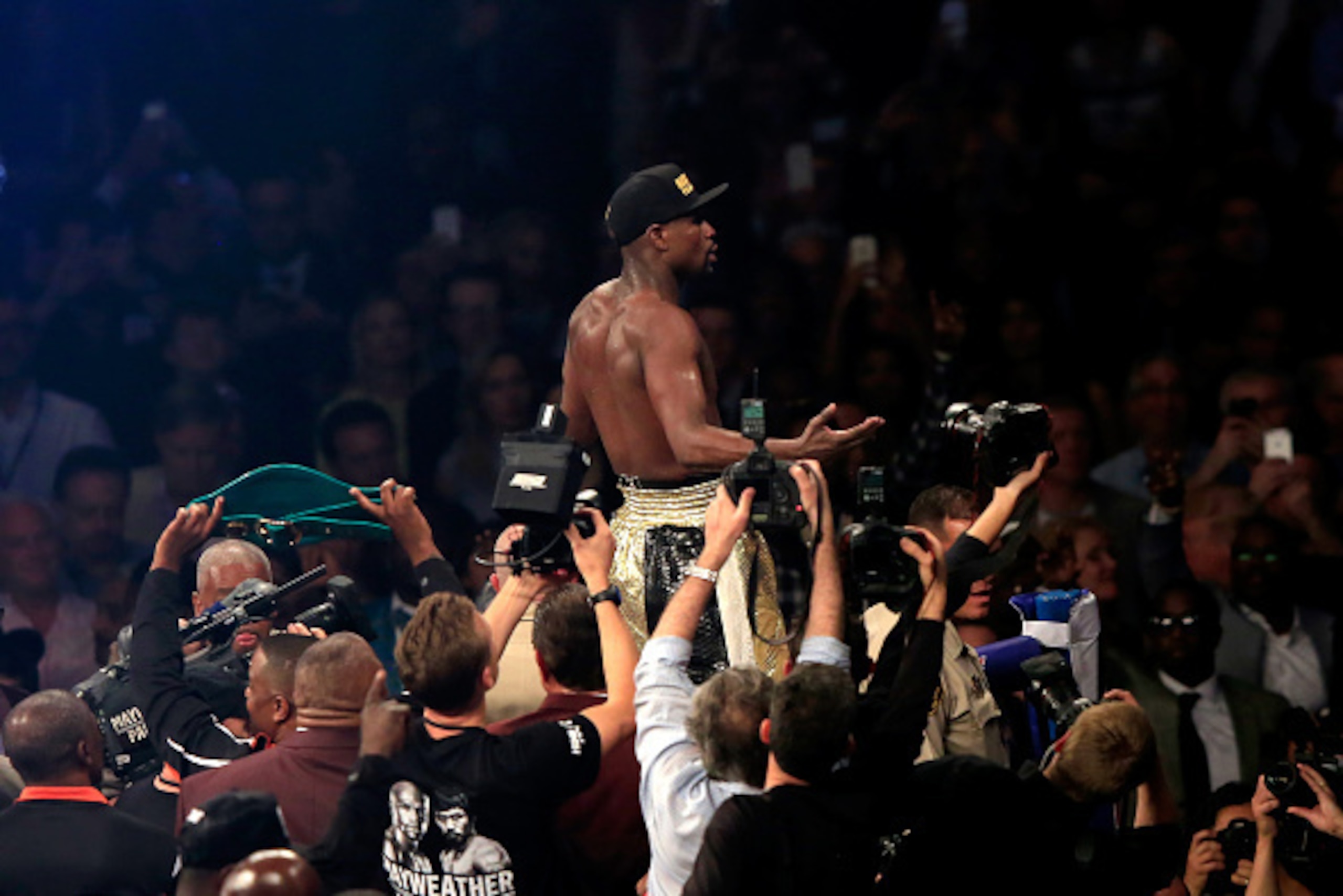 LAS VEGAS, NV - MAY 02:  Floyd Mayweather Jr. celebrates his unanimous decision victory against Manny Pacquiao in their  welterweight unification championship bout on May 2, 2015 at MGM Grand Garden Arena in Las Vegas, Nevada.  (Photo by Jamie Squire/Gett