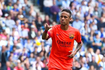 BARCELONA, SPAIN - APRIL 25:  Neymar of FC Barcelona celebrates after scoring the opening goal during the La Liga match between RCD Espanyol and FC Barcelona at Cornella-El Prat Stadium on April 25, 2015 in Barcelona, Spain.  (Photo by David Ramos/Getty I