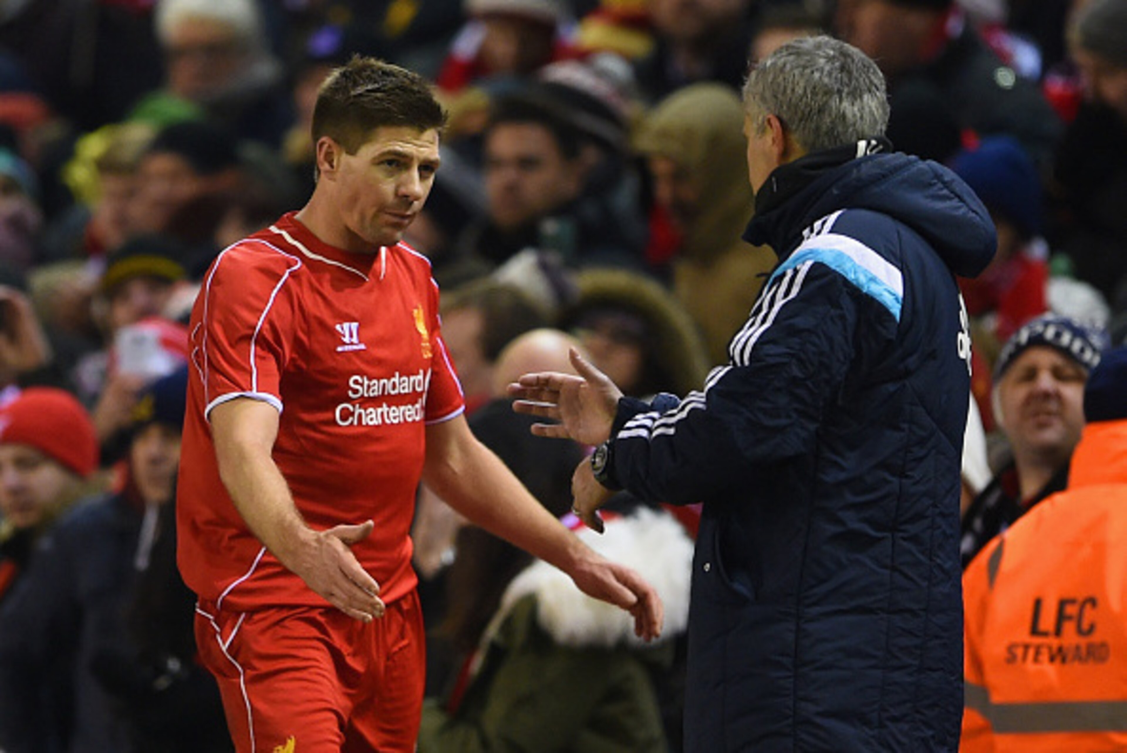 LIVERPOOL, ENGLAND - JANUARY 20:  Steven Gerrard of Liverpool shakes hands with Jose Mourinho manager of Chelsea as he is substitued during the Capital One Cup Semi-Final first leg match between Liverpool and Chelsea at Anfield on January 20, 2015 in Live
