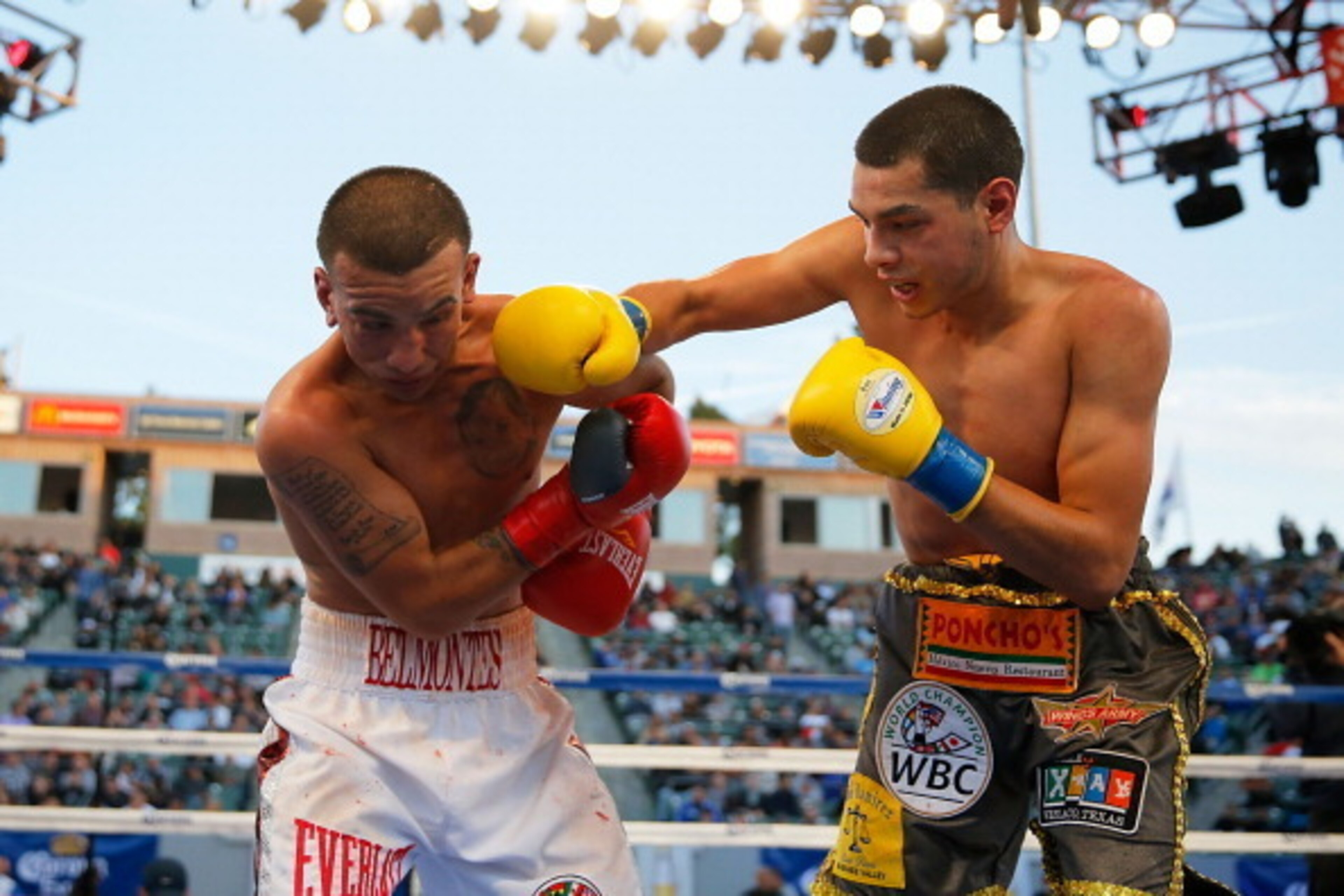 LOS ANGELES, CA - APRIL 26:  Omar Figueroa Jr. punches Jerry Belmontes during their WBC Lightweight World Championship title bout at StubHub Center on April 26, 2014 in Los Angeles, California.  (Photo by Joe Scarnici/Getty Images)