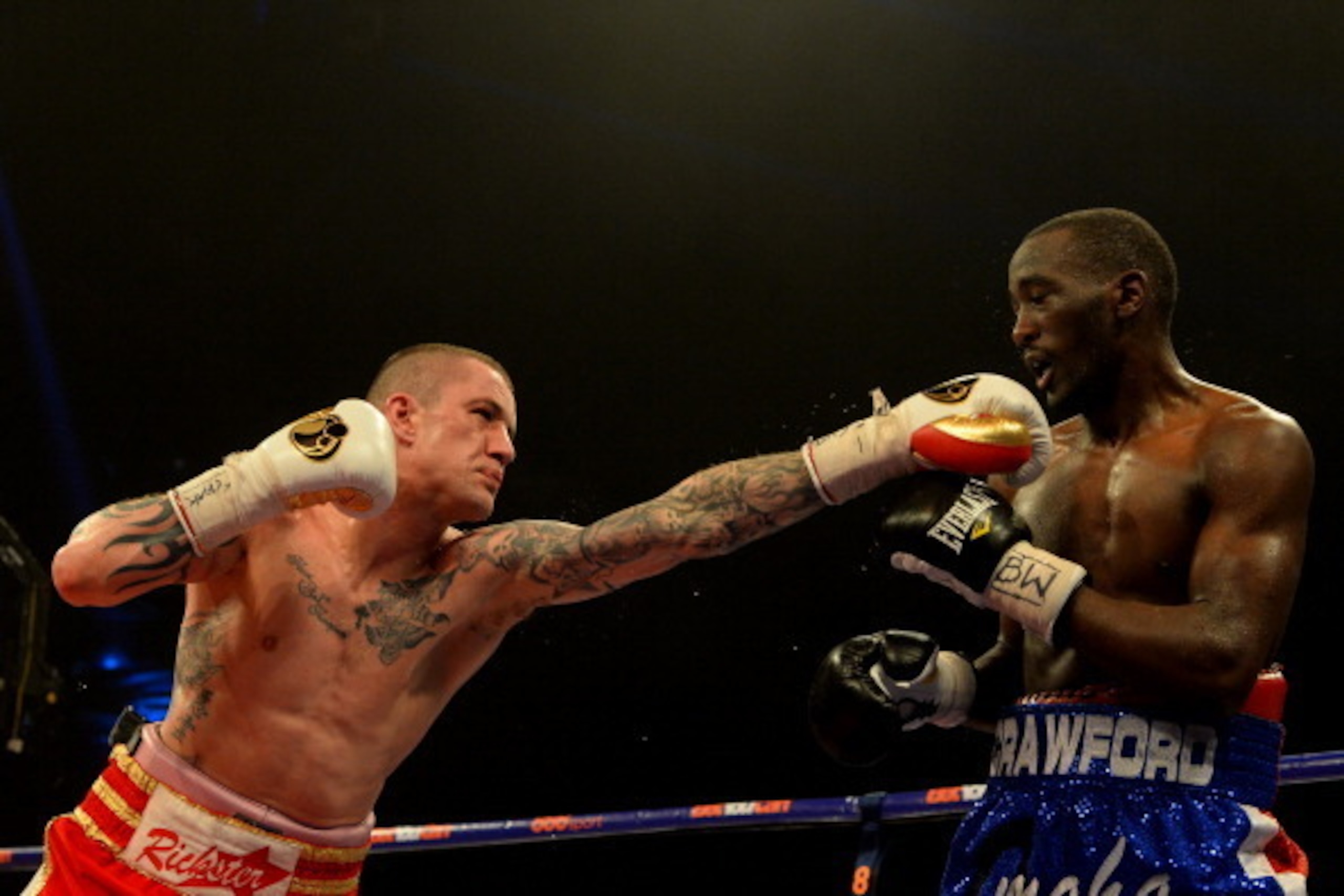 GLASGOW, SCOTLAND - MARCH 1 : Ricky Burns and Terence Crawford clash during the WBO World Lightweight Championship Boxing match at the Glasgow SECC on March 1 2014 in Glasgow, Scotland. (Photo by Mark Runnacles/Getty Images)