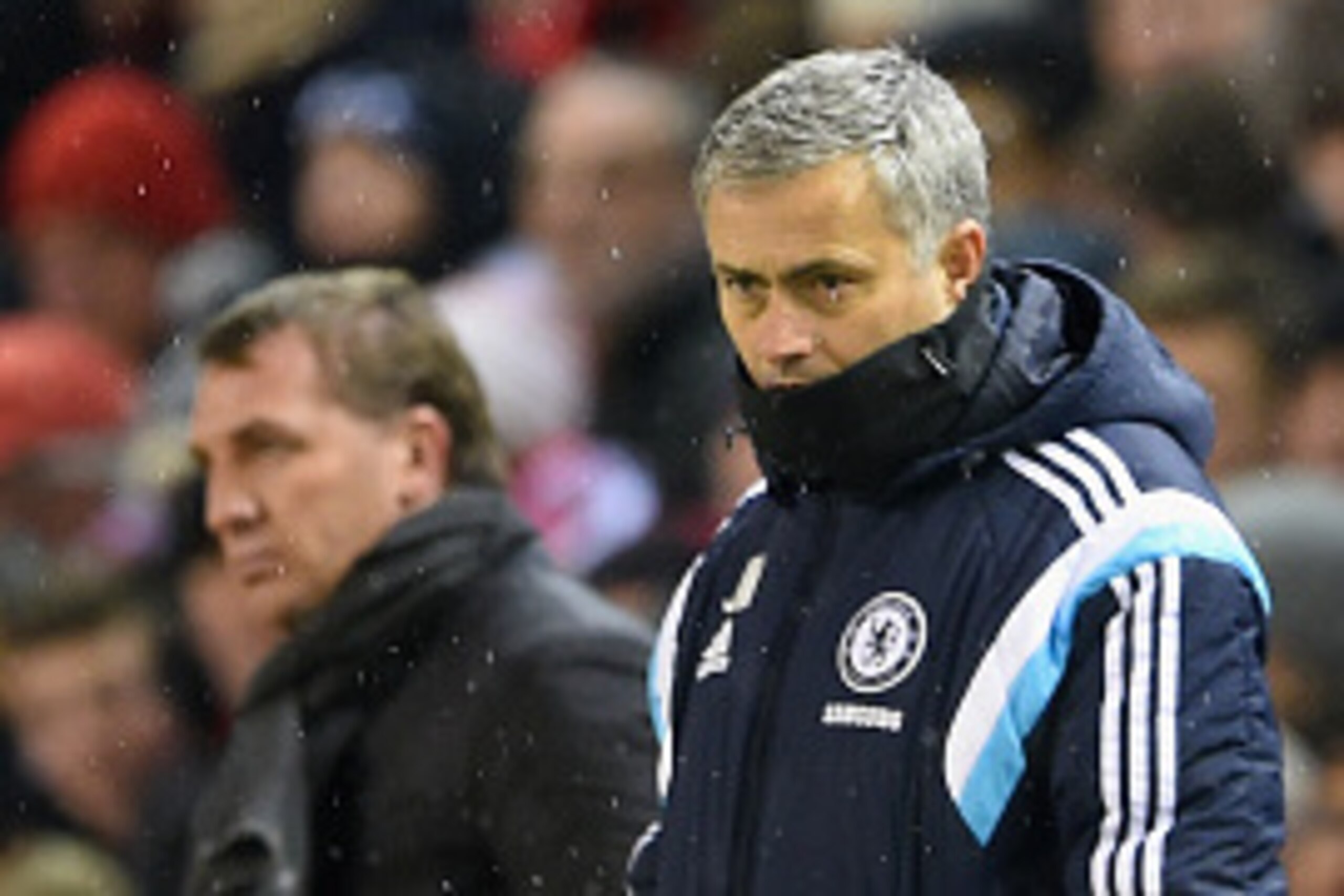 LIVERPOOL, ENGLAND - JANUARY 20:  Brendan Rodgers, manager of Liverpool and Jose Mourinho manager of Chelsea look on during the Capital One Cup Semi-Final first leg match between Liverpool and Chelsea at Anfield on January 20, 2015 in Liverpool, England. 