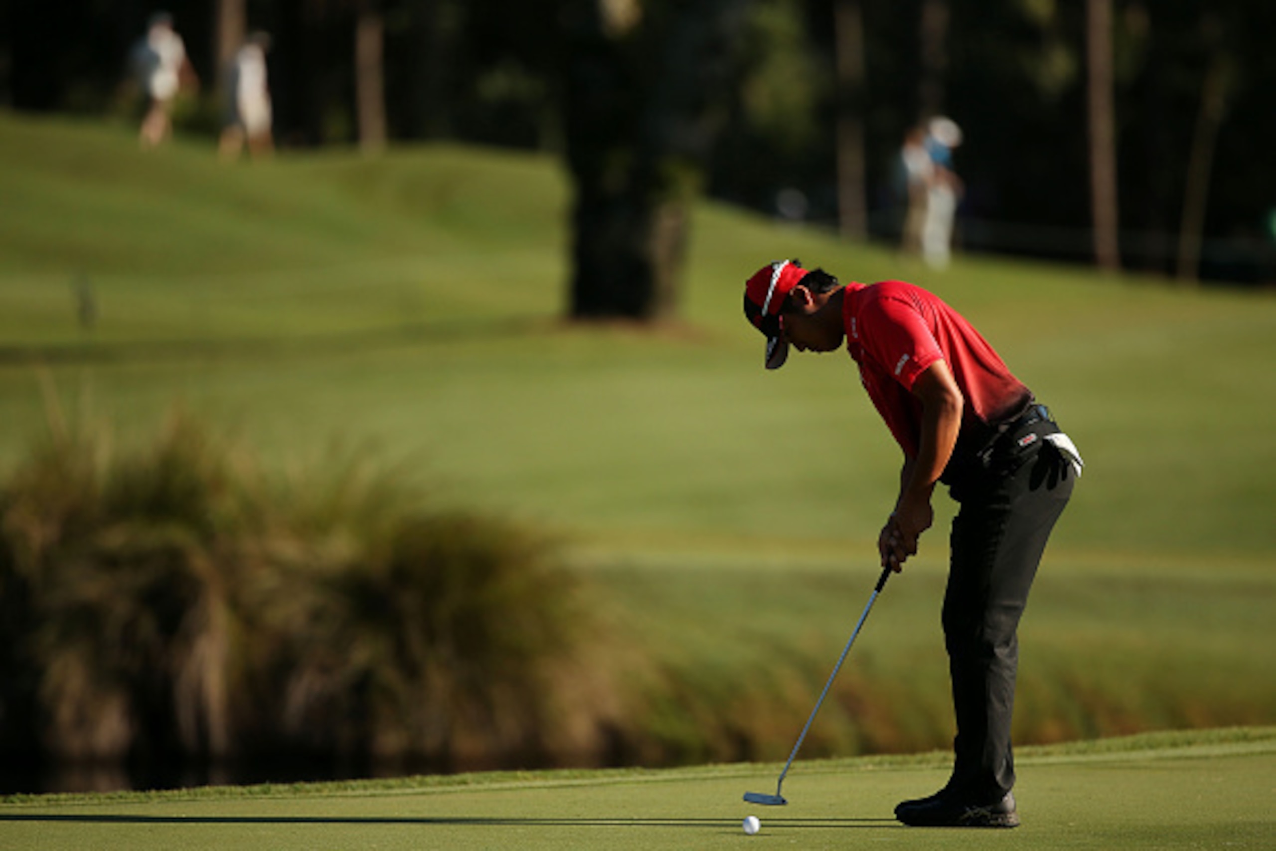 PONTE VEDRA BEACH, FL - MAY 07: Hideki Matsuyama of Japan putts on the 11th green during round one of THE PLAYERS Championship at the TPC Sawgrass Stadium course on May 7, 2015 in Ponte Vedra Beach, Florida. (Photo by Mike Ehrmann/Getty Images) PONTE VEDRA BEACH, FL - MAY 07: Hideki Matsuyama of Japan putts on the 11th green during round one of THE PLAYERS Championship at the TPC Sawgrass Stadium course on May 7, 2015 in Ponte Vedra Beach, Florida. (Photo by Mike Ehrmann/Getty Images)