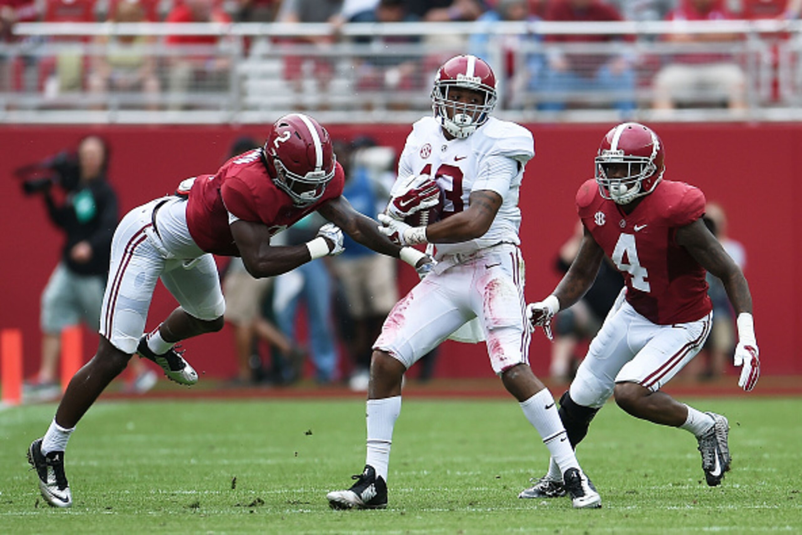 TUSCALOOSA, AL - APRIL 18: ArDarius Stewart #13 of the White team is pursued by Tony Brown #2 and Eddie Jackson #4 of the Crimson team during the University of Alabama A Day spring game at Bryant-Denny Stadium on April 18, 2015 in Tuscaloosa, Alabama. ( TUSCALOOSA, AL - APRIL 18: ArDarius Stewart #13 of the White team is pursued by Tony Brown #2 and Eddie Jackson #4 of the Crimson team during the University of Alabama A Day spring game at Bryant-Denny Stadium on April 18, 2015 in Tuscaloosa, Alabama. (