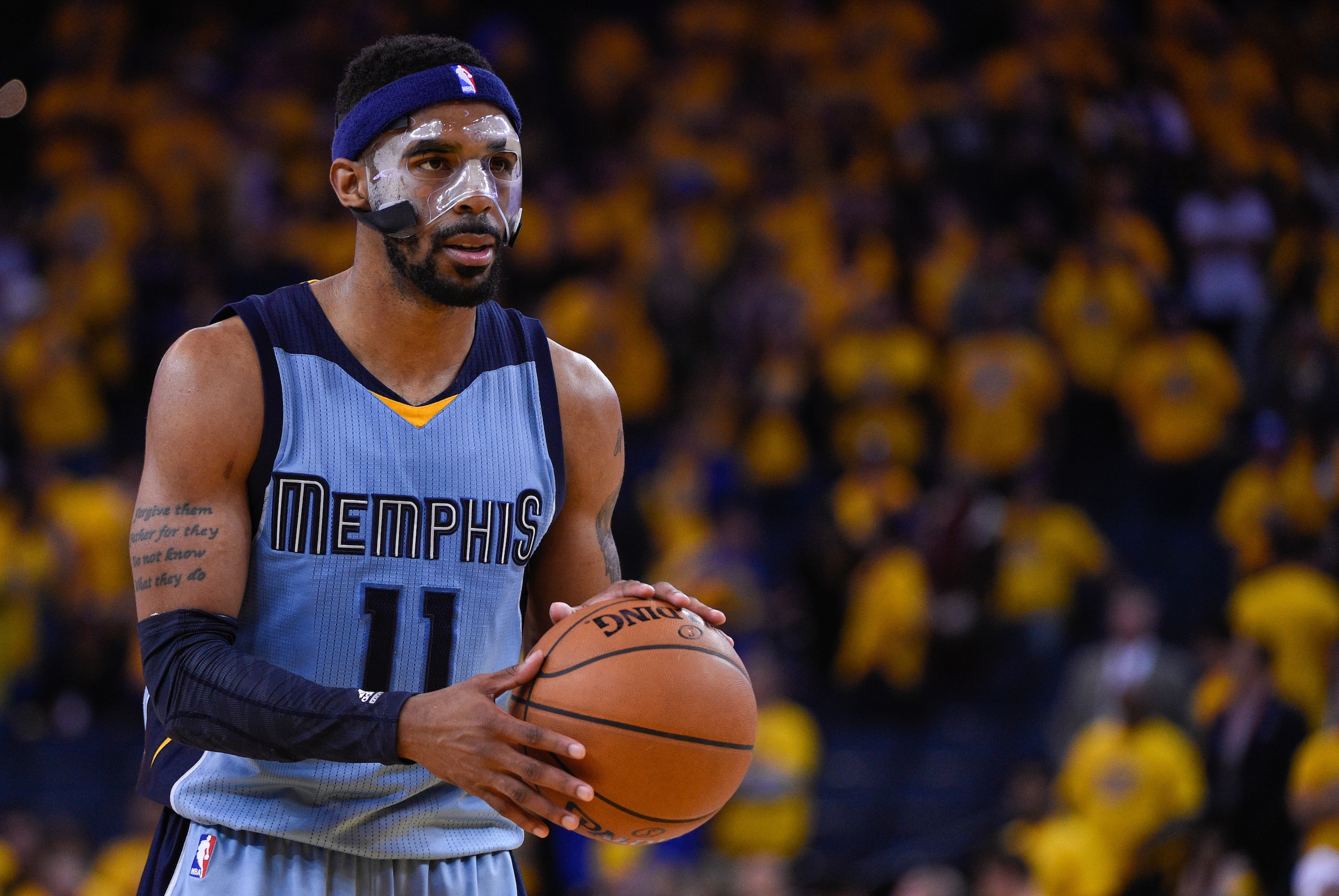 May 5, 2015; Oakland, CA, USA; Memphis Grizzlies guard Mike Conley (11) prepares to shoot a free throw during the fourth quarter in game two of the second round of the NBA Playoffs against the Golden State Warriors at Oracle Arena. The Grizzlies defeated