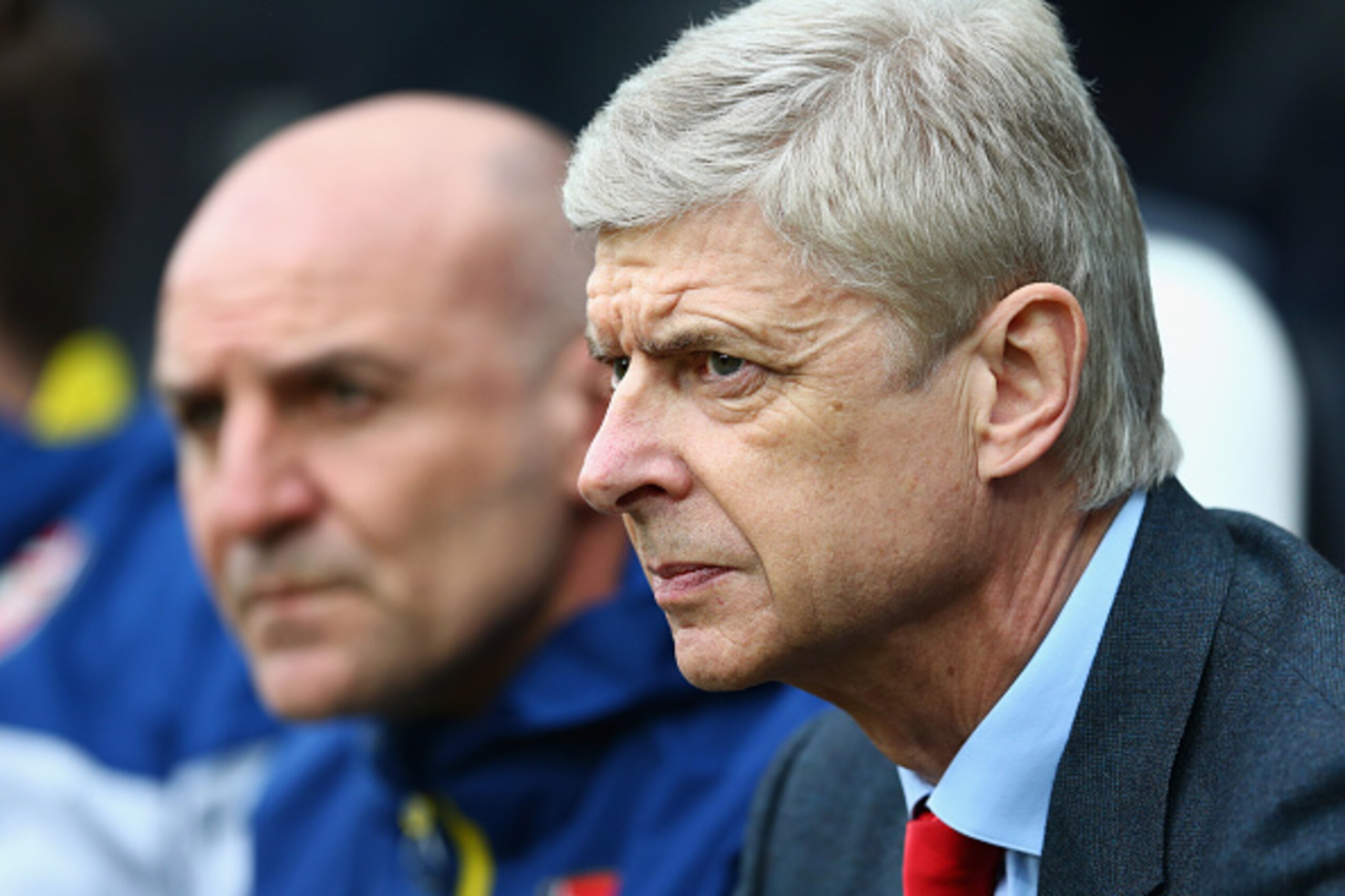 NEWCASTLE UPON TYNE, ENGLAND - MARCH 21: Arsene Wenger, manager of Arsenal looks on with Steve Bould during the Barclays Premier League match between Newcastle United and Arsenal at St James' Park on March 21, 2015 in Newcastle upon Tyne, England.  (Photo