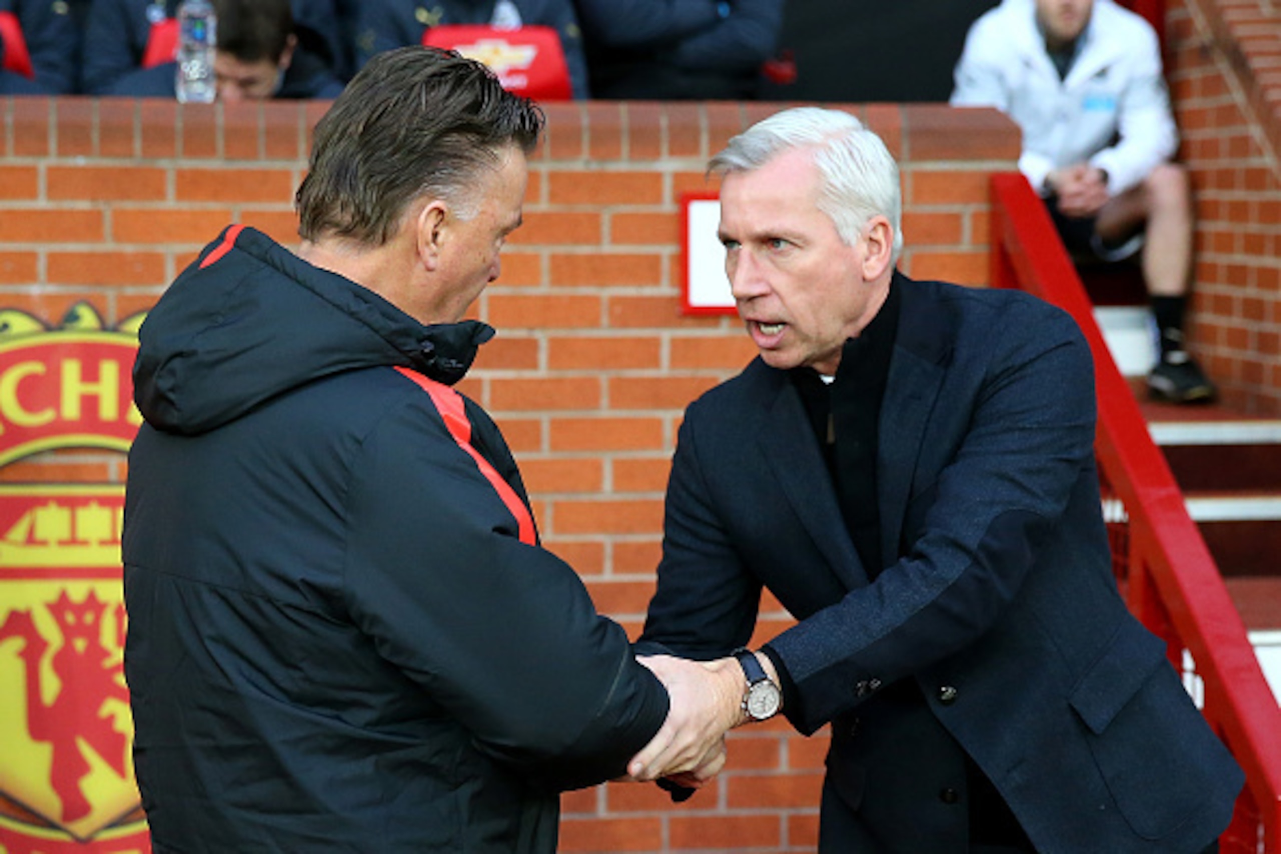 MANCHESTER, ENGLAND - DECEMBER 26: Manchester United Manager Louis van Gaal greets Newcastle United Manager Alan Pardew (R) prior to the Barclays Premier League match between Manchester United and Newcastle United at Old Trafford on December 26, 2014 in MANCHESTER, ENGLAND - DECEMBER 26: Manchester United Manager Louis van Gaal greets Newcastle United Manager Alan Pardew (R) prior to the Barclays Premier League match between Manchester United and Newcastle United at Old Trafford on December 26, 2014 in