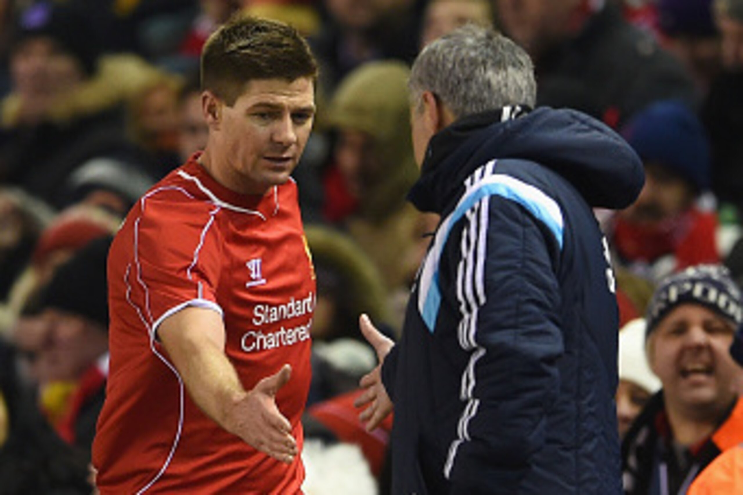 LIVERPOOL, ENGLAND - JANUARY 20:  Steven Gerrard of Liverpool shakes hands with Jose Mourinho manager of Chelsea as he is substitued during the Capital One Cup Semi-Final first leg match between Liverpool and Chelsea at Anfield on January 20, 2015 in Live