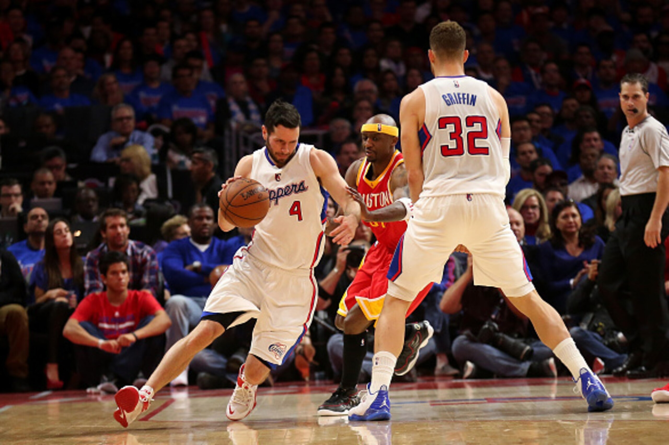 LOS ANGELES, CA - MAY 08:  J.J. Redick #4 of of the Los Angeles Clippers drives around Jason Terry #31 of the Houston Rockets using a screen set by Blake Griffin #32 during Game Three of the Western Conference semifinals of the 2015 NBA Playoffs at Staple