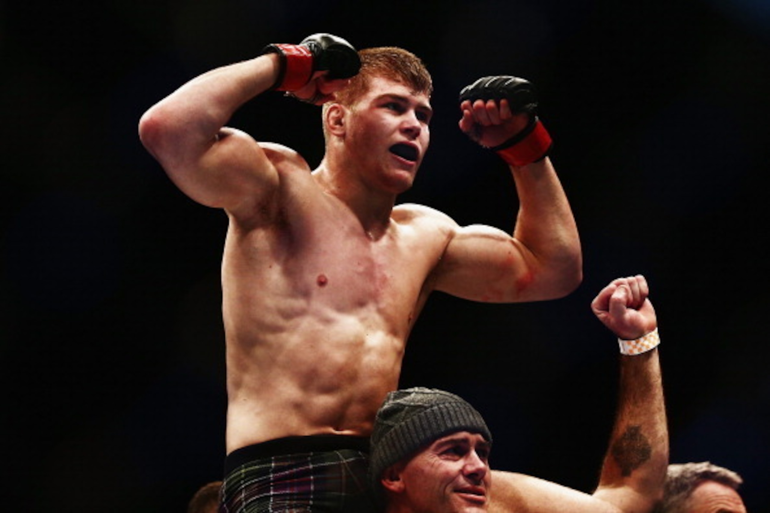 AUCKLAND, NEW ZEALAND - JUNE 28:  Jake Matthews of Australia celebrates after winning the UFC Lightweight bout between Jake Matthews of Australia and Dashon Johnson of USA on June 28, 2014 in Auckland, New Zealand.  (Photo by Hannah Peters/Getty Images)