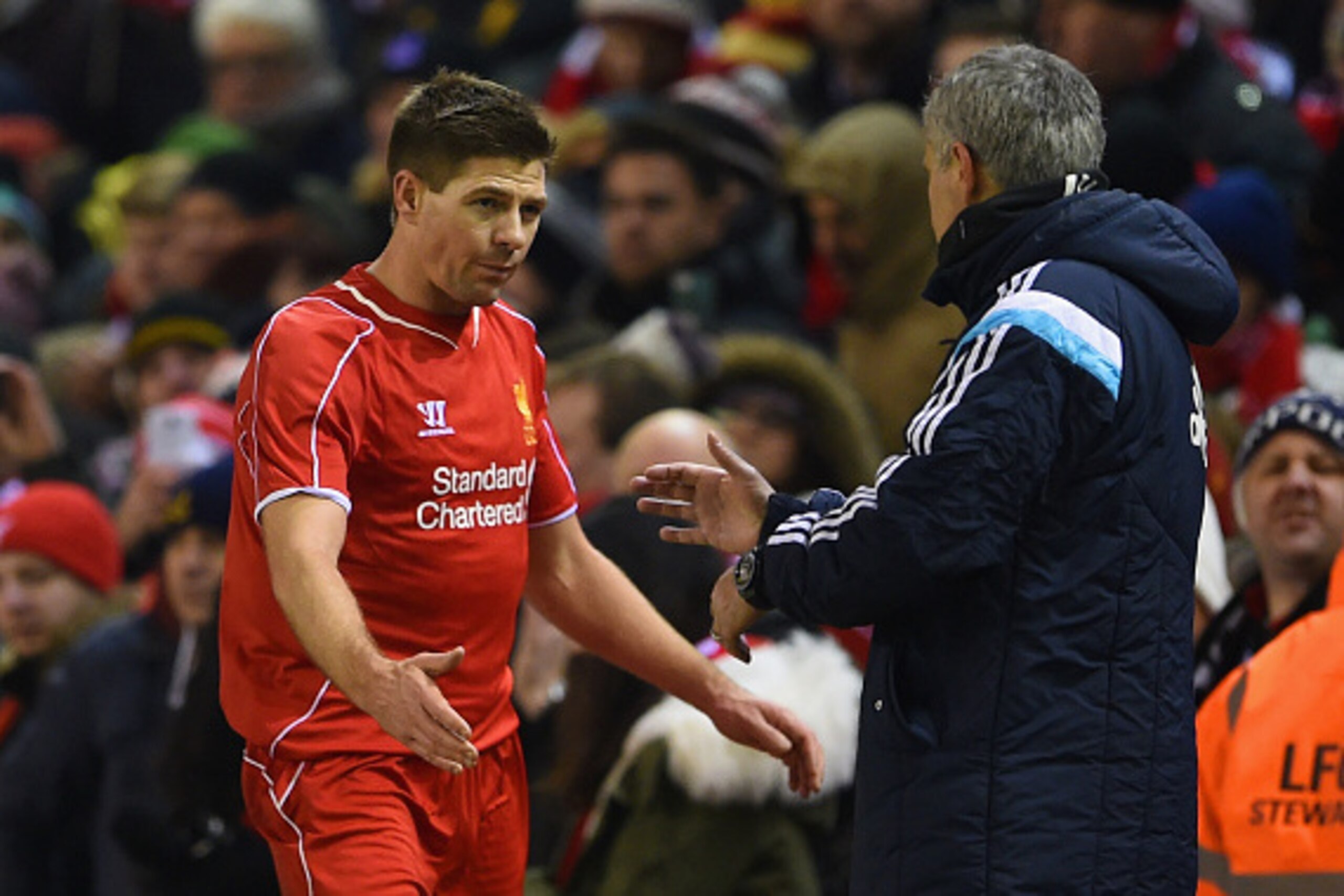 LIVERPOOL, ENGLAND - JANUARY 20:  Steven Gerrard of Liverpool shakes hands with Jose Mourinho manager of Chelsea as he is substitued during the Capital One Cup Semi-Final first leg match between Liverpool and Chelsea at Anfield on January 20, 2015 in Live