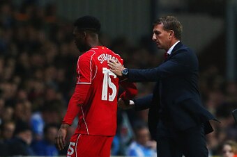 BLACKBURN, ENGLAND - APRIL 08:  Brendan Rodgers manager of Liverpool shakes hands with Daniel Sturridge of Liverpool as he is substituted during the FA Cup Quarter Final Replay match between Blackburn Rovers and Liverpool at Ewood Park on April 8, 2015 in