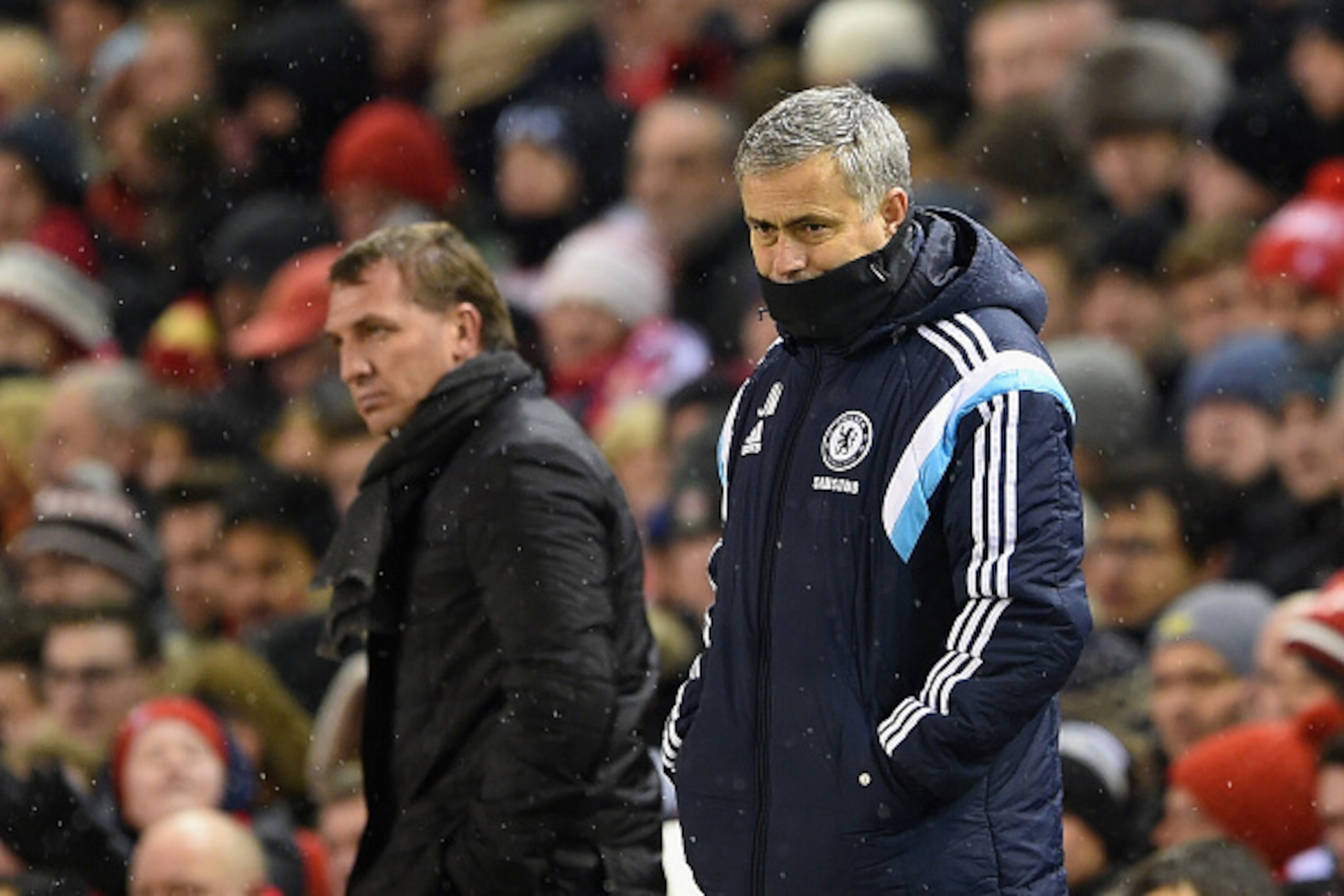 LIVERPOOL, ENGLAND - JANUARY 20:  Brendan Rodgers, manager of Liverpool and Jose Mourinho manager of Chelsea look on during the Capital One Cup Semi-Final first leg match between Liverpool and Chelsea at Anfield on January 20, 2015 in Liverpool, England. 