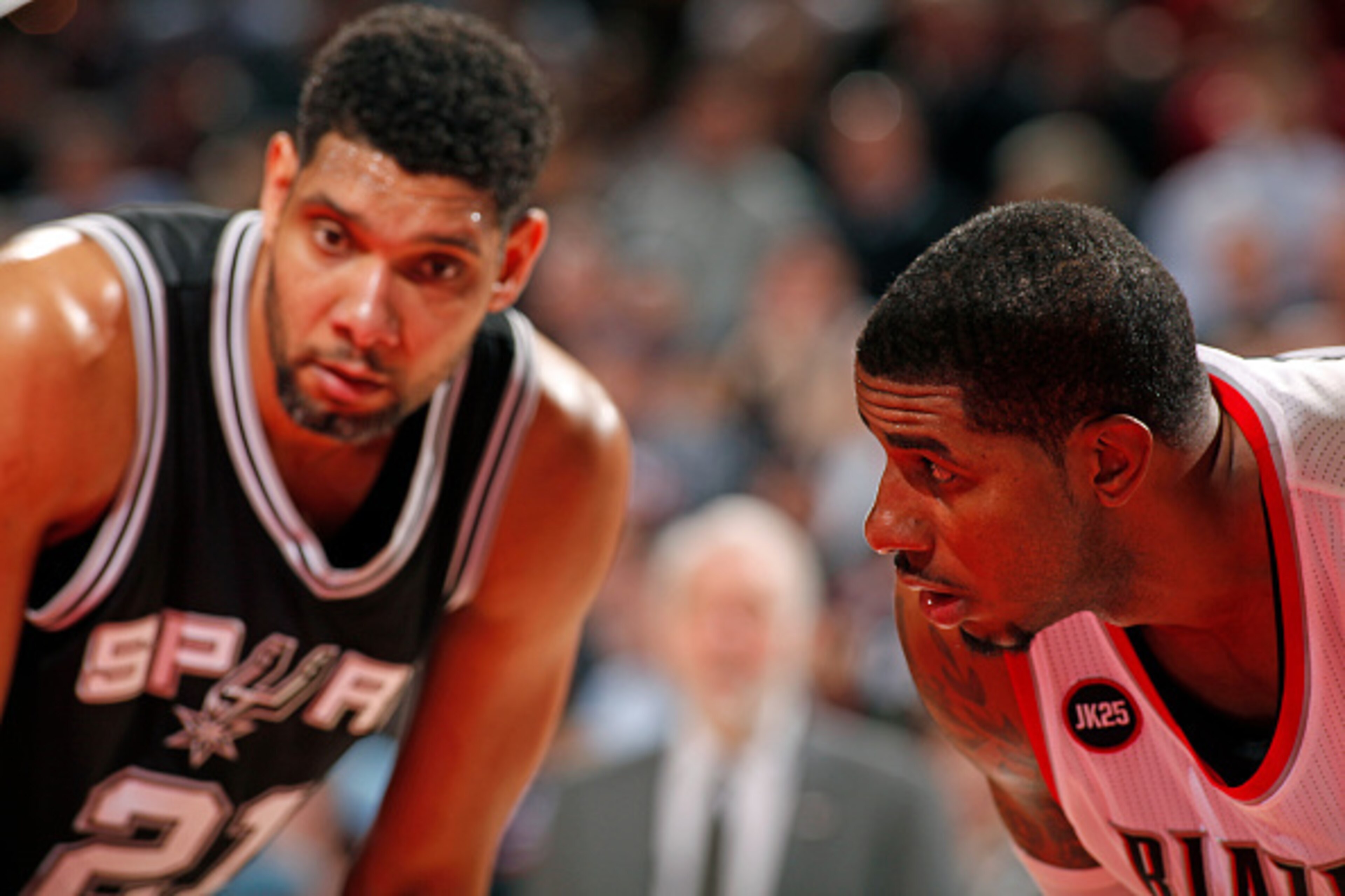 PORTLAND, OR - FEBRUARY 25:  Tim Duncan #21 of the San Antonio Spurs and LaMarcus Aldridge #12 of the Portland Trail Blazers during the game on February 25, 2015 at the Moda Center Arena in Portland, Oregon. NOTE TO USER: User expressly acknowledges and a