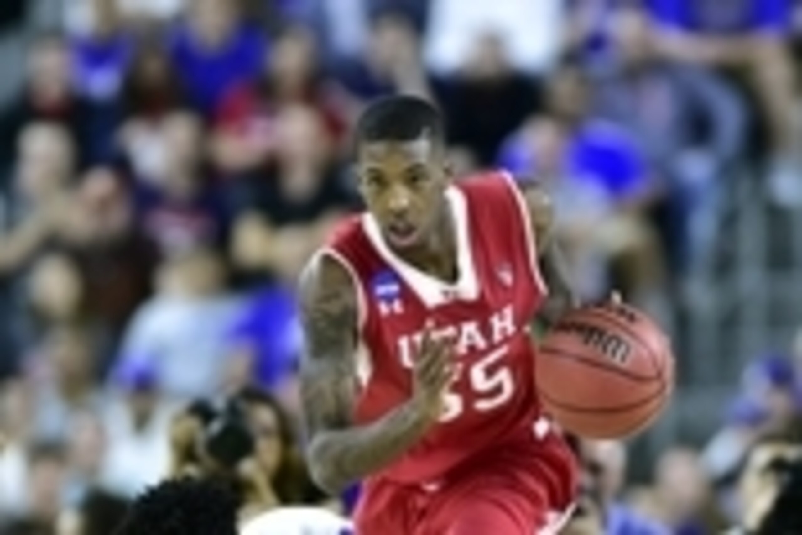 Mar 27, 2015; Houston, TX, USA; Utah Utes guard Delon Wright (55) takes the ball away from Duke Blue Devils guard Quinn Cook (2) during the second half in the semifinals of the south regional of the 2015 NCAA Tournament at NRG Stadium. Mandatory Credit: B