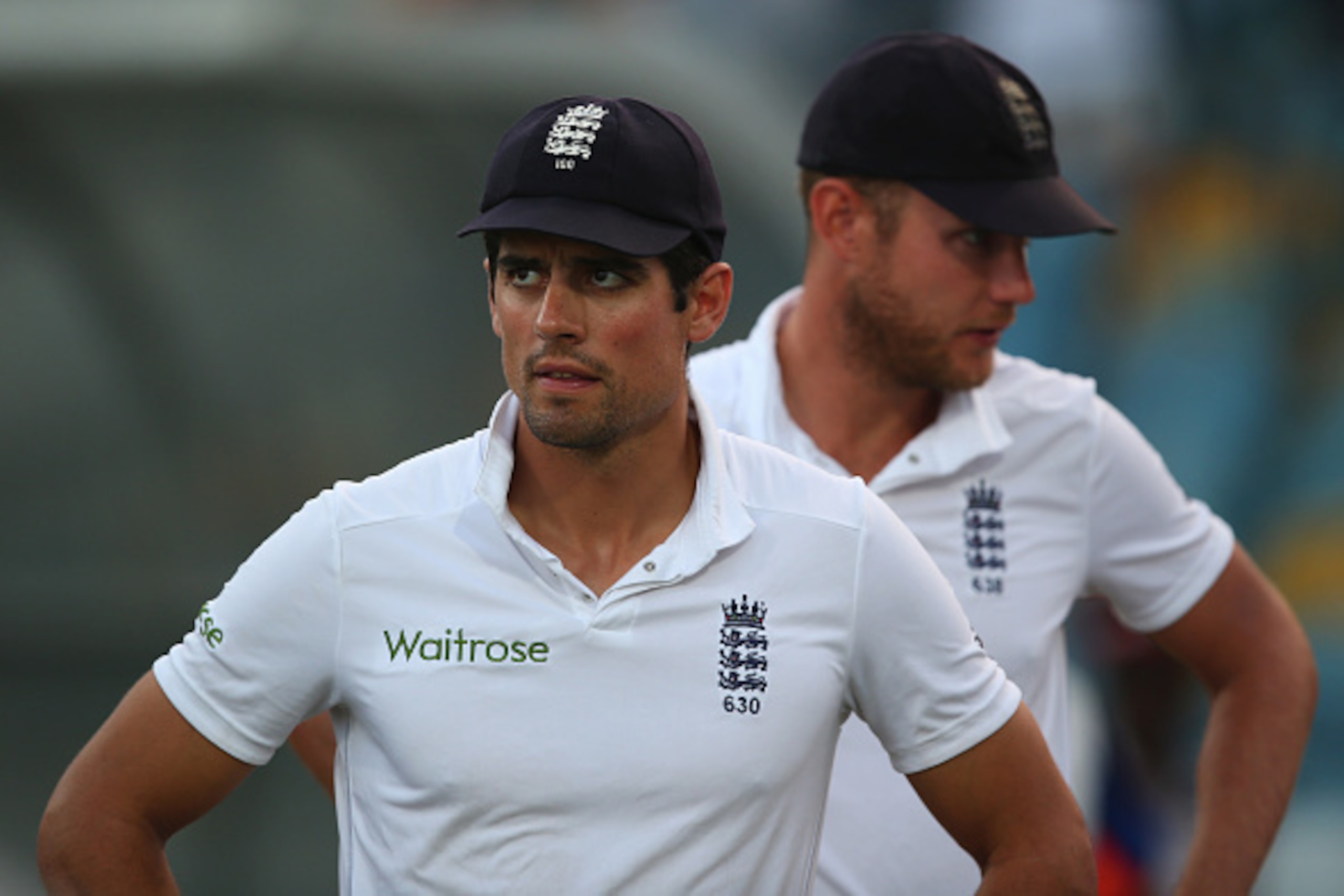 BRIDGETOWN, BARBADOS - MAY 03:  Alastair Cook  the captain of England  looks on at the after match presentations alongside Stuart Broad as the series was squared 1-1 after West Indies won the match by five wickets during day three of the 3rd Test match be