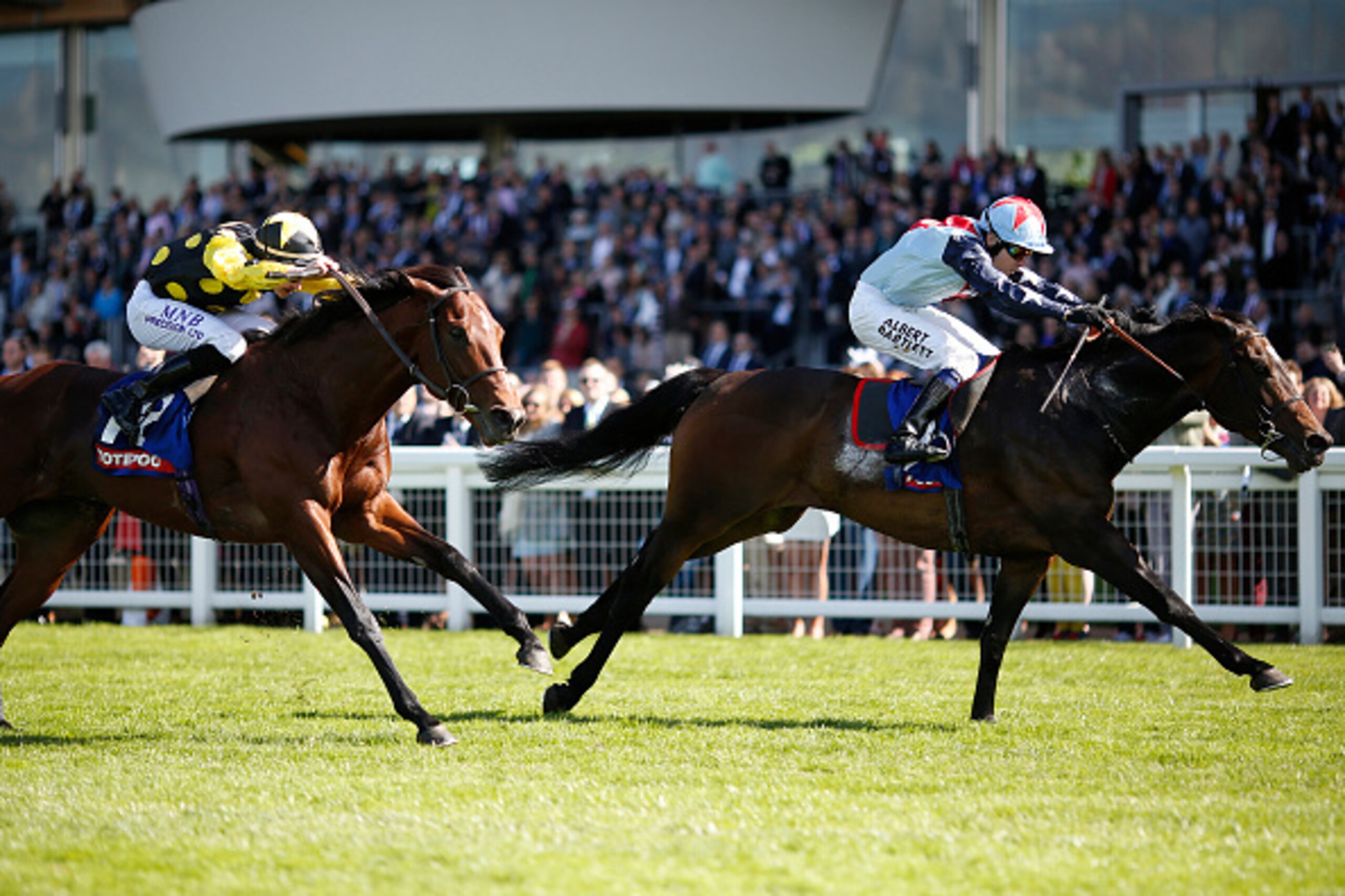 ASCOT, ENGLAND - MAY 09:  Jamie Spencer riding Speculative Bid (R) win The totescoop6 Victoria Cup at Ascot racecourse on May 09, 2015 in Ascot, England. (Photo by Alan Crowhurst/Getty Images)