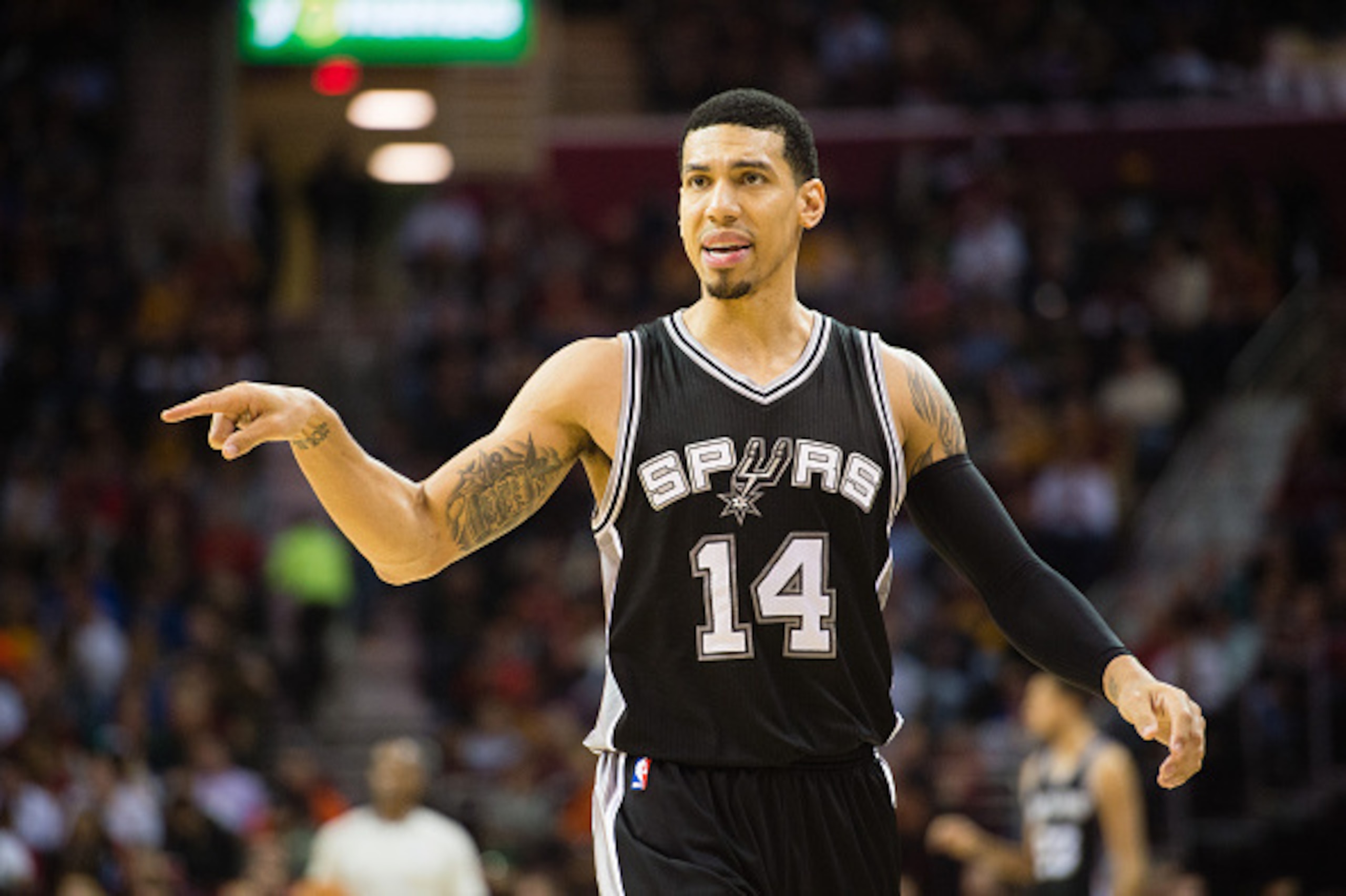 CLEVELAND, OH - NOVEMBER 19: Danny Green #14 of the San Antonio Spurs talks to his teammates during the first half against the Cleveland Cavaliers at Quicken Loans Arena on November 19, 2014 in Cleveland, Ohio. User expressly acknowledges and agrees that,