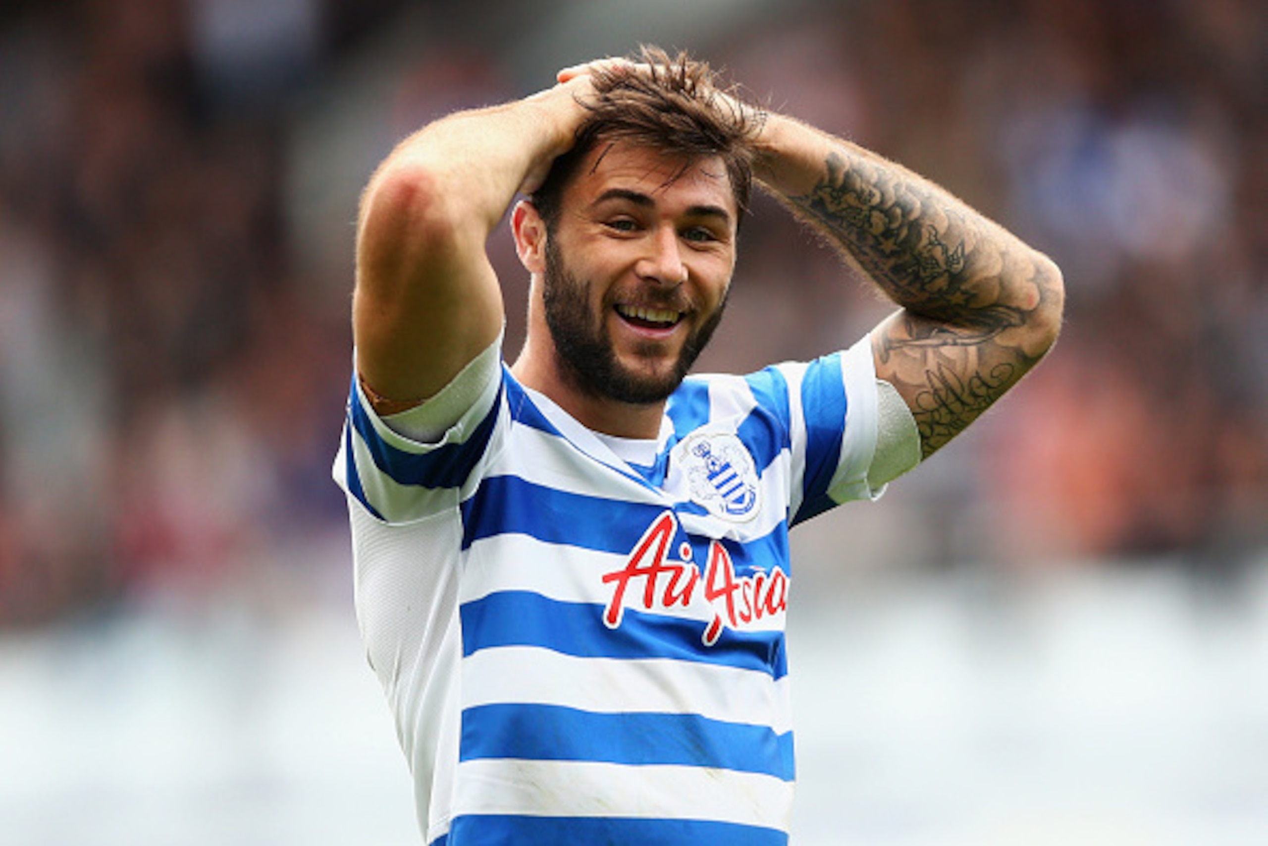 LONDON, ENGLAND - APRIL 25:  Charlie Austin of QPR reacts during the Barclays Premier League match between Queens Park Rangers and West Ham United at Loftus Road on April 25, 2015 in London, England.  (Photo by Paul Gilham/Getty Images)