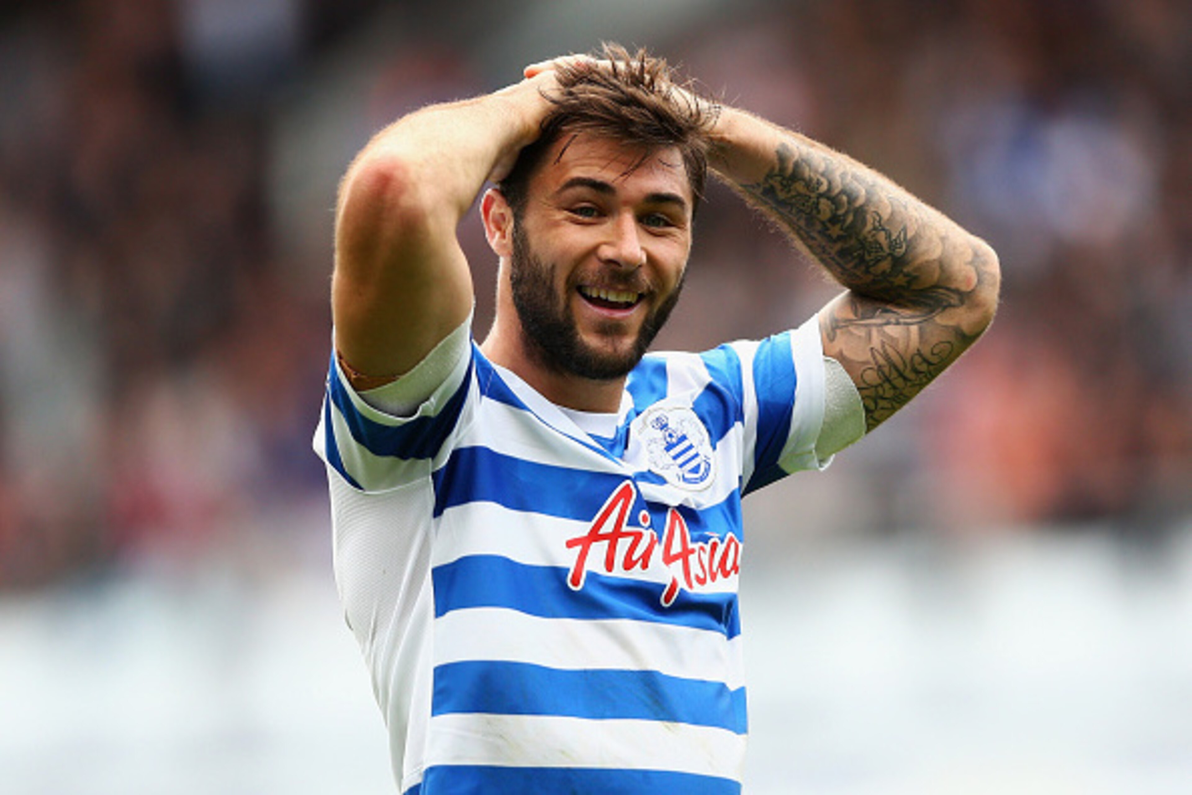 LONDON, ENGLAND - APRIL 25:  Charlie Austin of QPR reacts during the Barclays Premier League match between Queens Park Rangers and West Ham United at Loftus Road on April 25, 2015 in London, England.  (Photo by Paul Gilham/Getty Images)