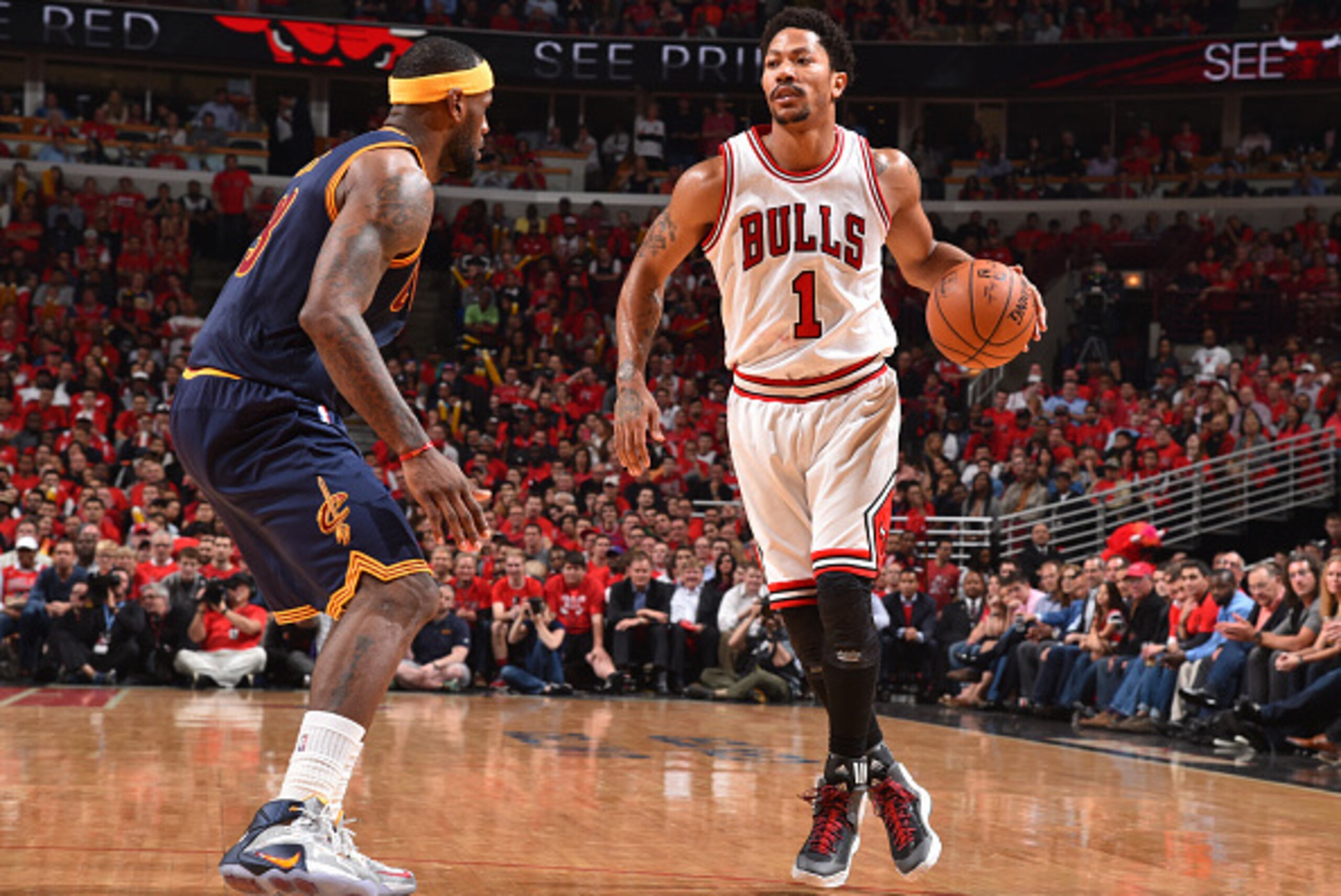 CHICAGO,IL :  Derrick Rose #1 of the Chicago Bulls against LeBron James #23 of the Cleveland Cavaliers at the United Center During Game Two of the Eastern Conference Semifinals during the 2015 NBA Playoffs on May 8, 2015 in Chicago,Illinois NOTE TO USER: 
