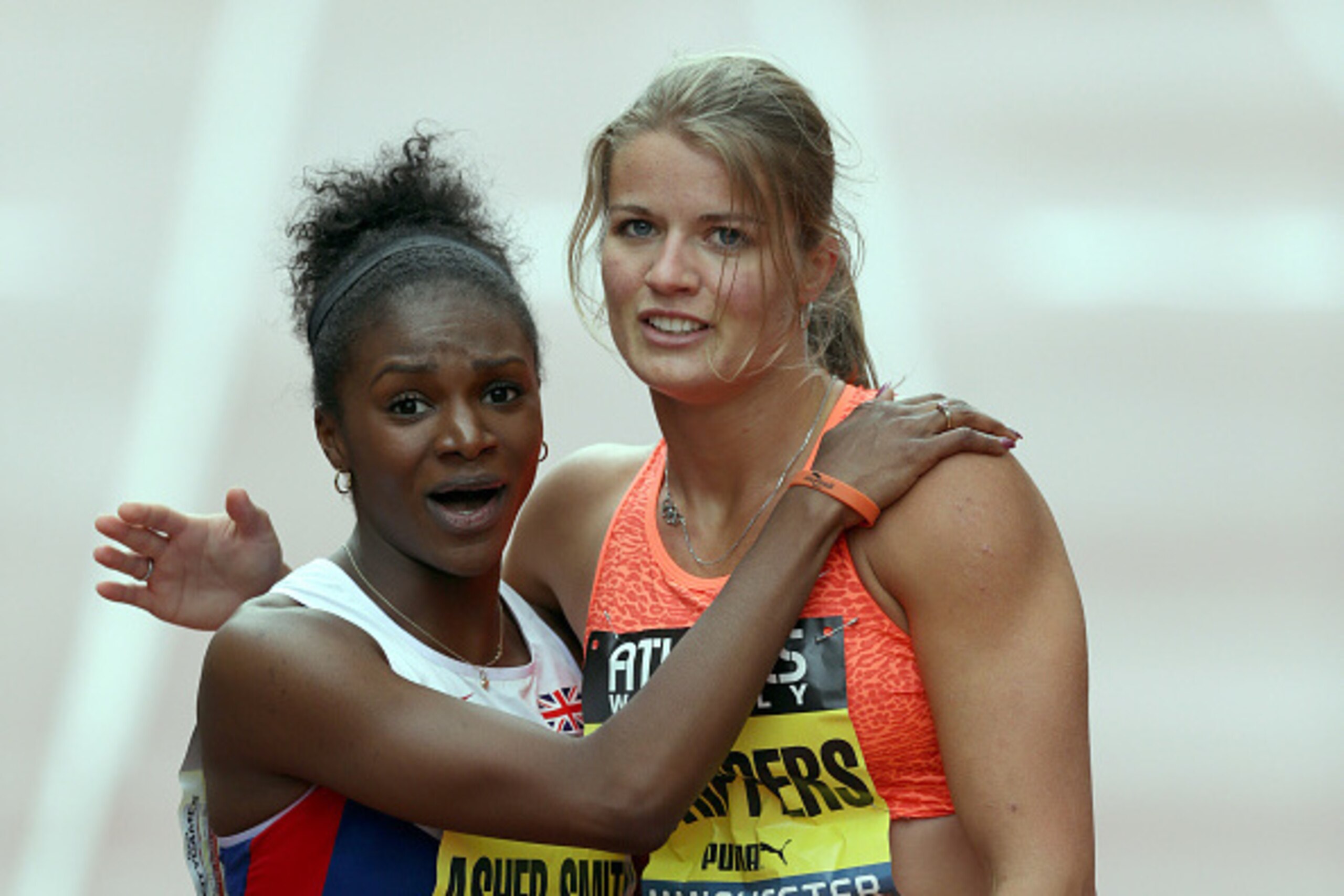 MANCHESTER, ENGLAND - MAY 9: Dina Asher-Smith (L) of Great Britain is congratulated by Dafne Schippers of the Netherlands after winning the women's 150 metres during the Great City Games on May 9, 2015 in Manchester, England. (Photo by Clint Hughes/Getty MANCHESTER, ENGLAND - MAY 9: Dina Asher-Smith (L) of Great Britain is congratulated by Dafne Schippers of the Netherlands after winning the women's 150 metres during the Great City Games on May 9, 2015 in Manchester, England. (Photo by Clint Hughes/Getty