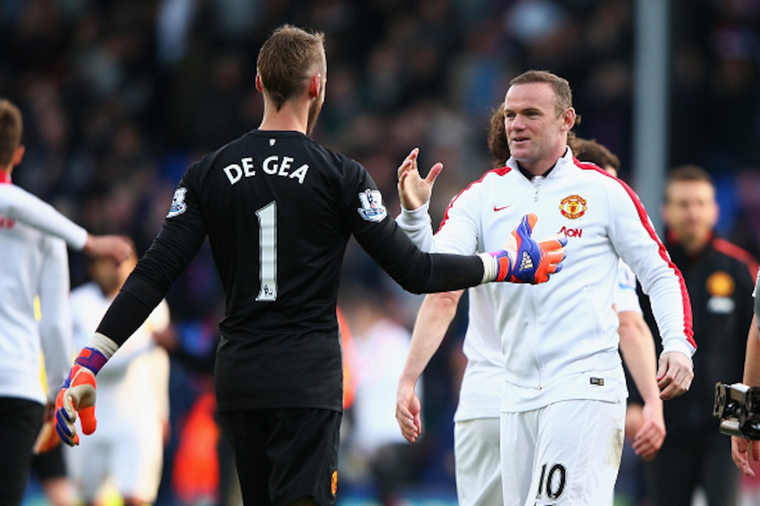 LONDON, ENGLAND - MAY 09: Wayne Rooney of Manchester United celebrates victory with David De Gea of Manchester United after the Barclays Premier League match between Crystal Palace and Manchester United at Selhurst Park on May 9, 2015 in London, England. 