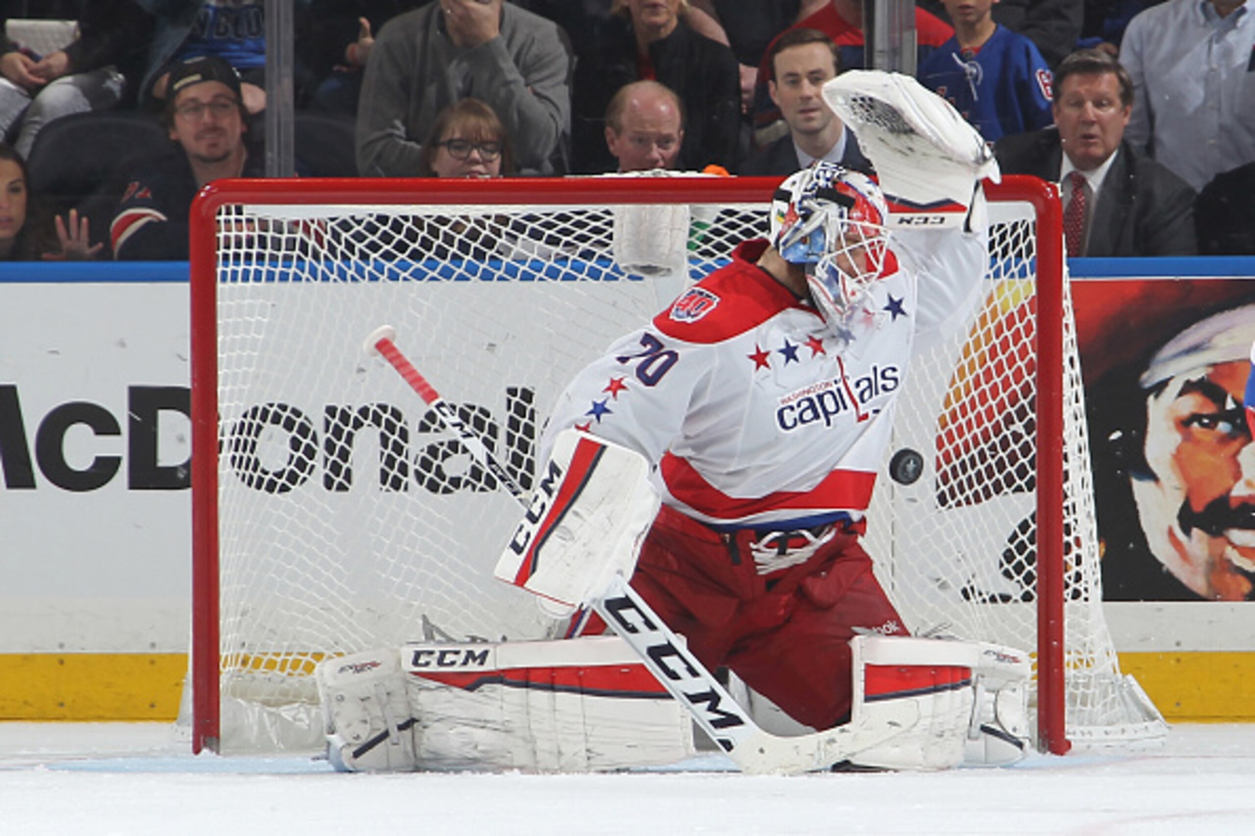 NEW YORK, NY - MAY 08:  Braden Holtby #70 of the Washington Capitals makes a glove save against the New York Rangers during Game Five of the Eastern Conference Semifinals during the 2015 NHL Stanley Cup Playoffs at Madison Square Garden on May 8, 2015 in 