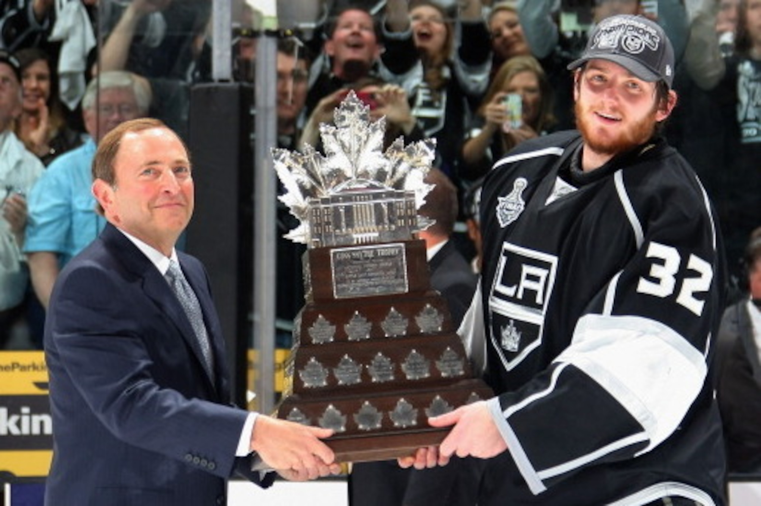 LOS ANGELES, CA - JUNE 11:  Goaltender Jonathan Quick #32 of the Los Angeles Kings (R) is presented the Conn Smythe award from NHL commissioner Gary Bettman (L) after the Los Angeles Kings defeated the New Jersey Devils 6-1 in Game Six of the 2012 Stanley